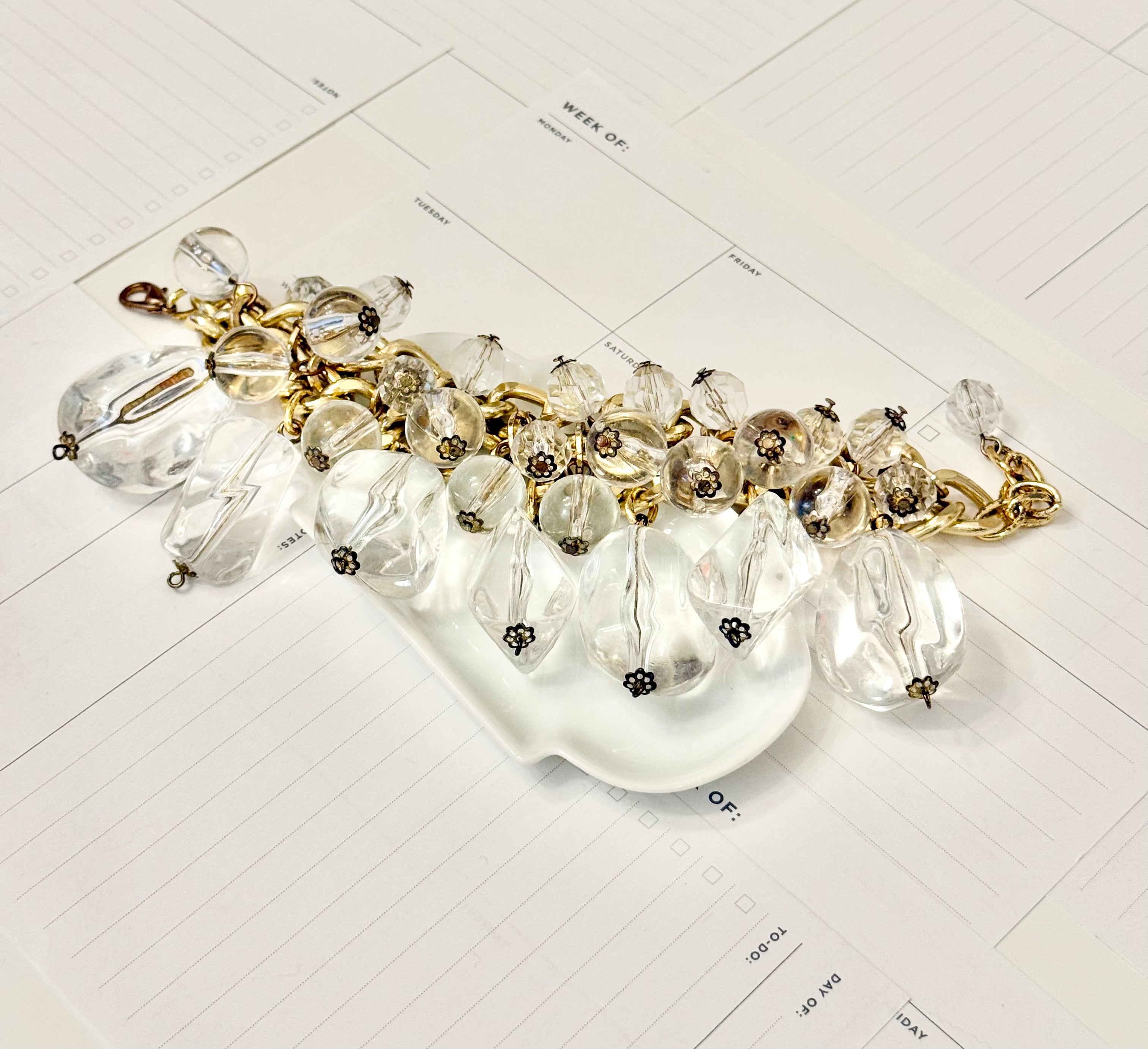 That dramatic lucite charm bracelet....so extraordinary