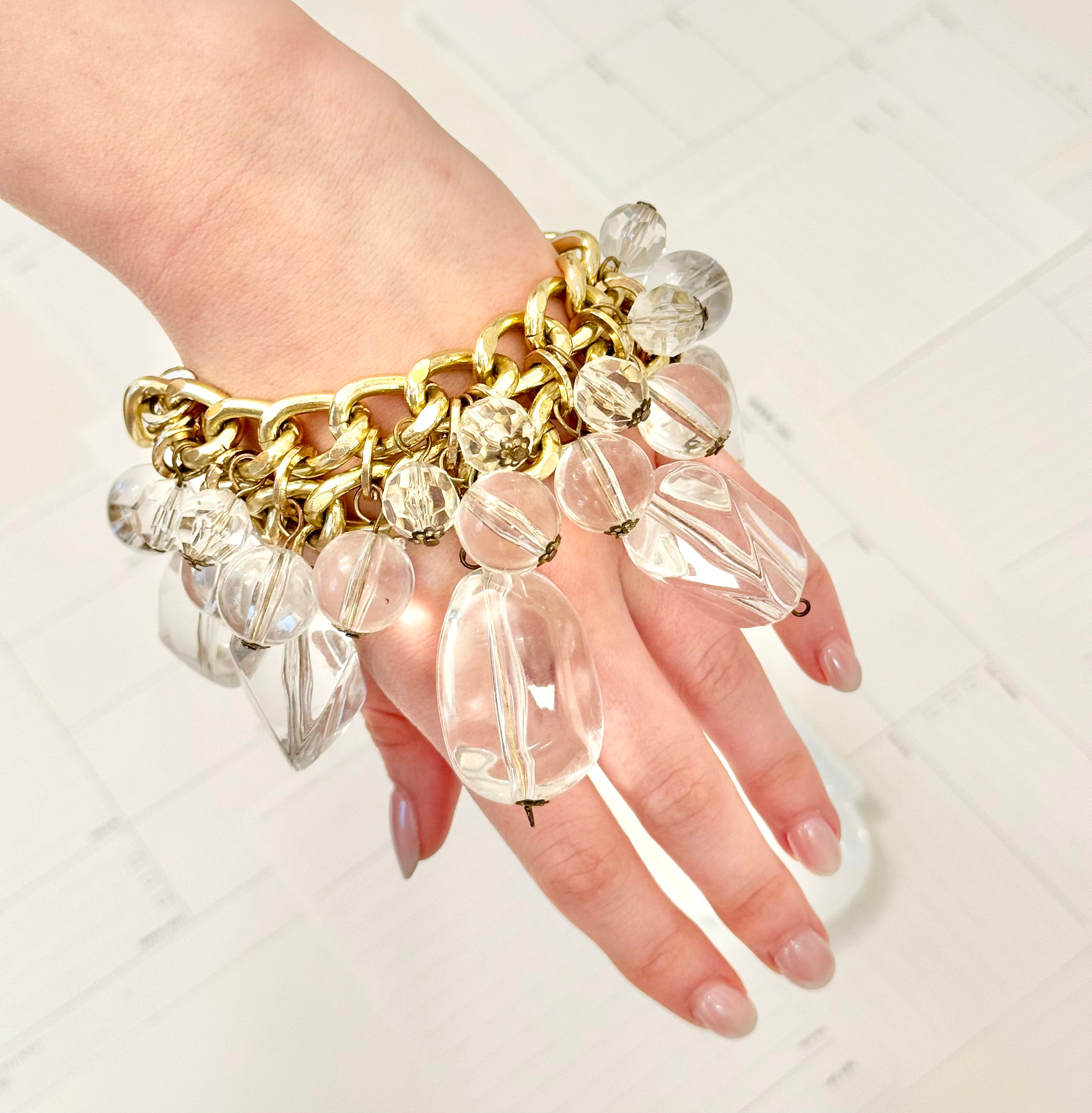 That dramatic lucite charm bracelet....so extraordinary