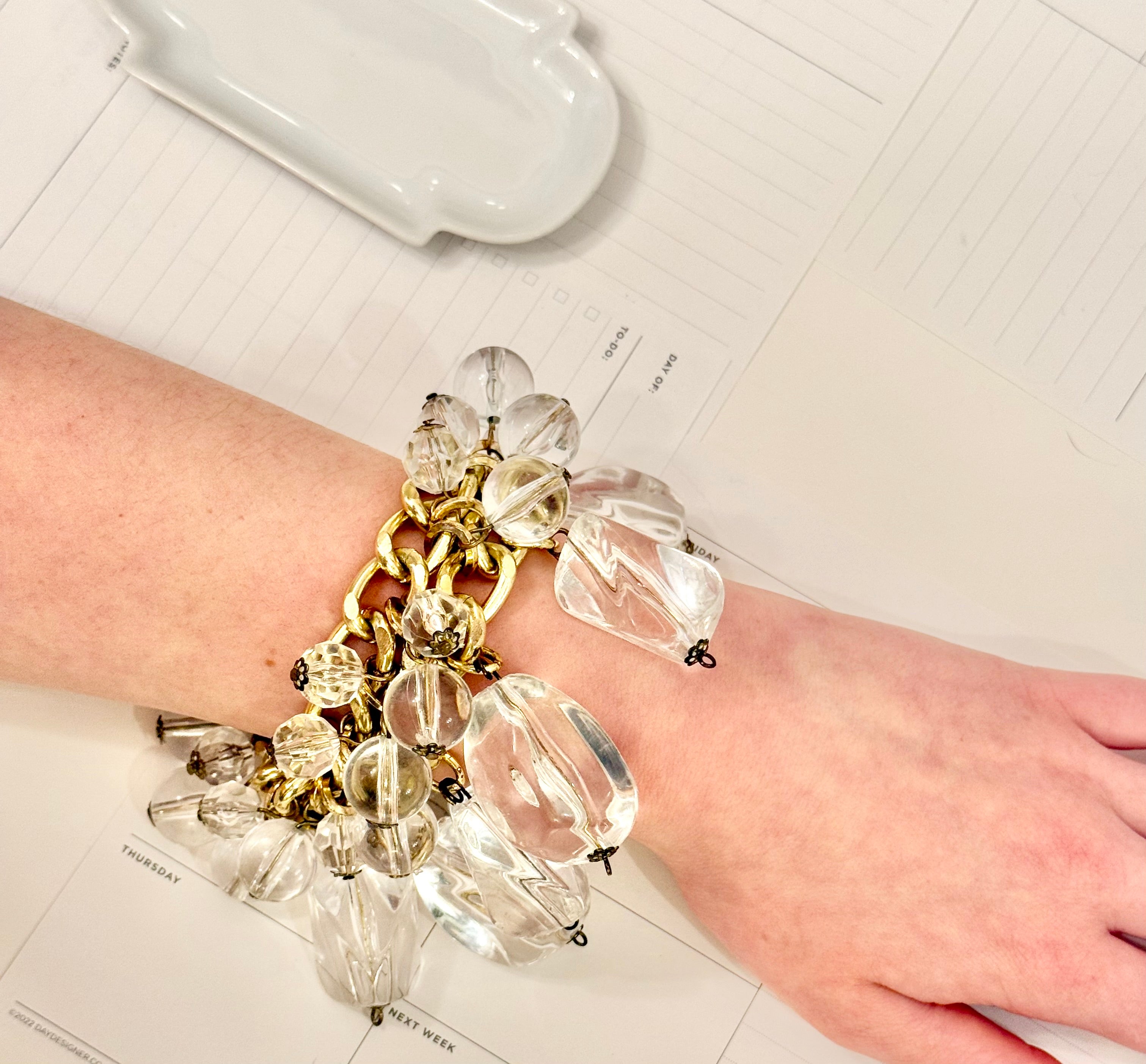 That dramatic lucite charm bracelet....so extraordinary