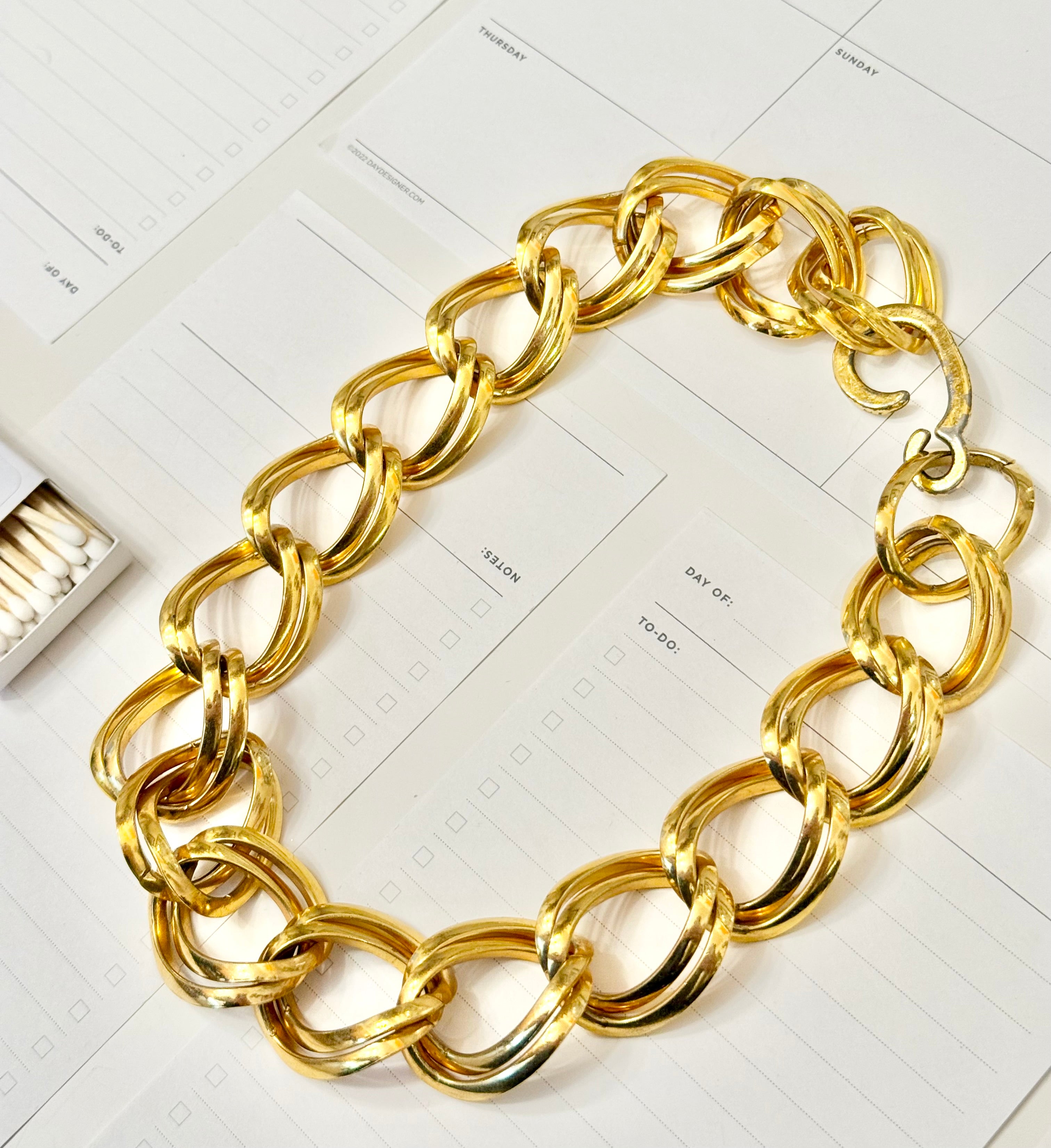 The socilaite and her love of layering gold chains...