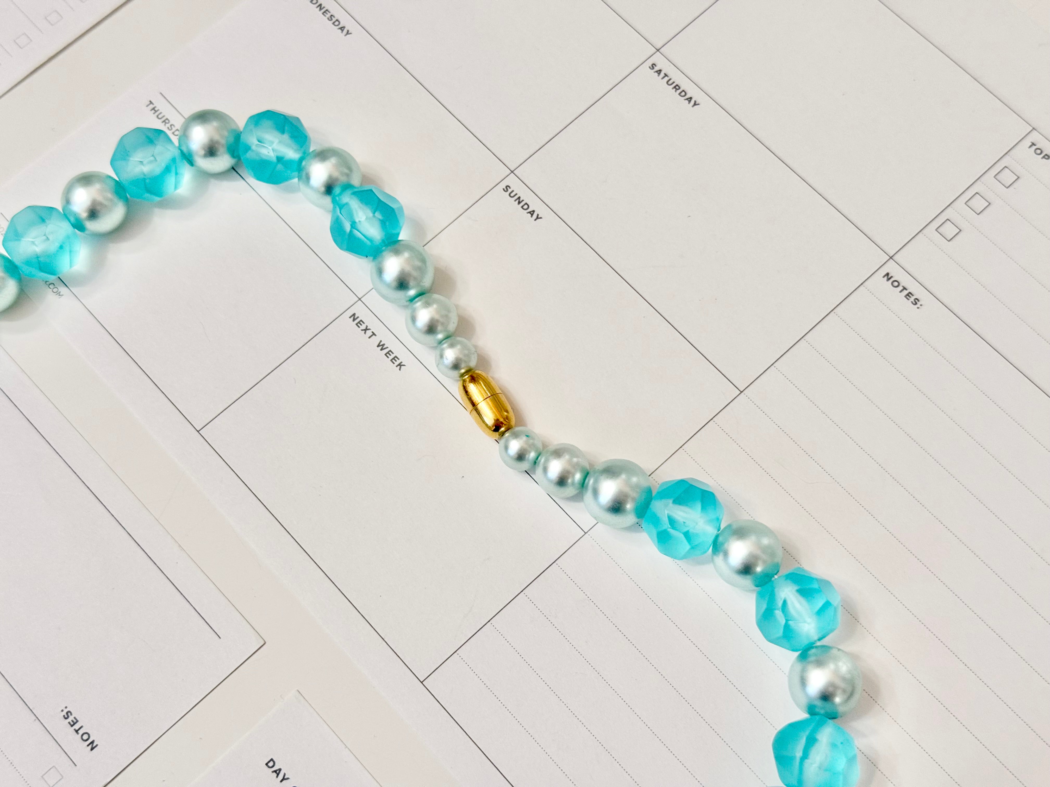 The most perfect aqua lucite long beaded necklace...