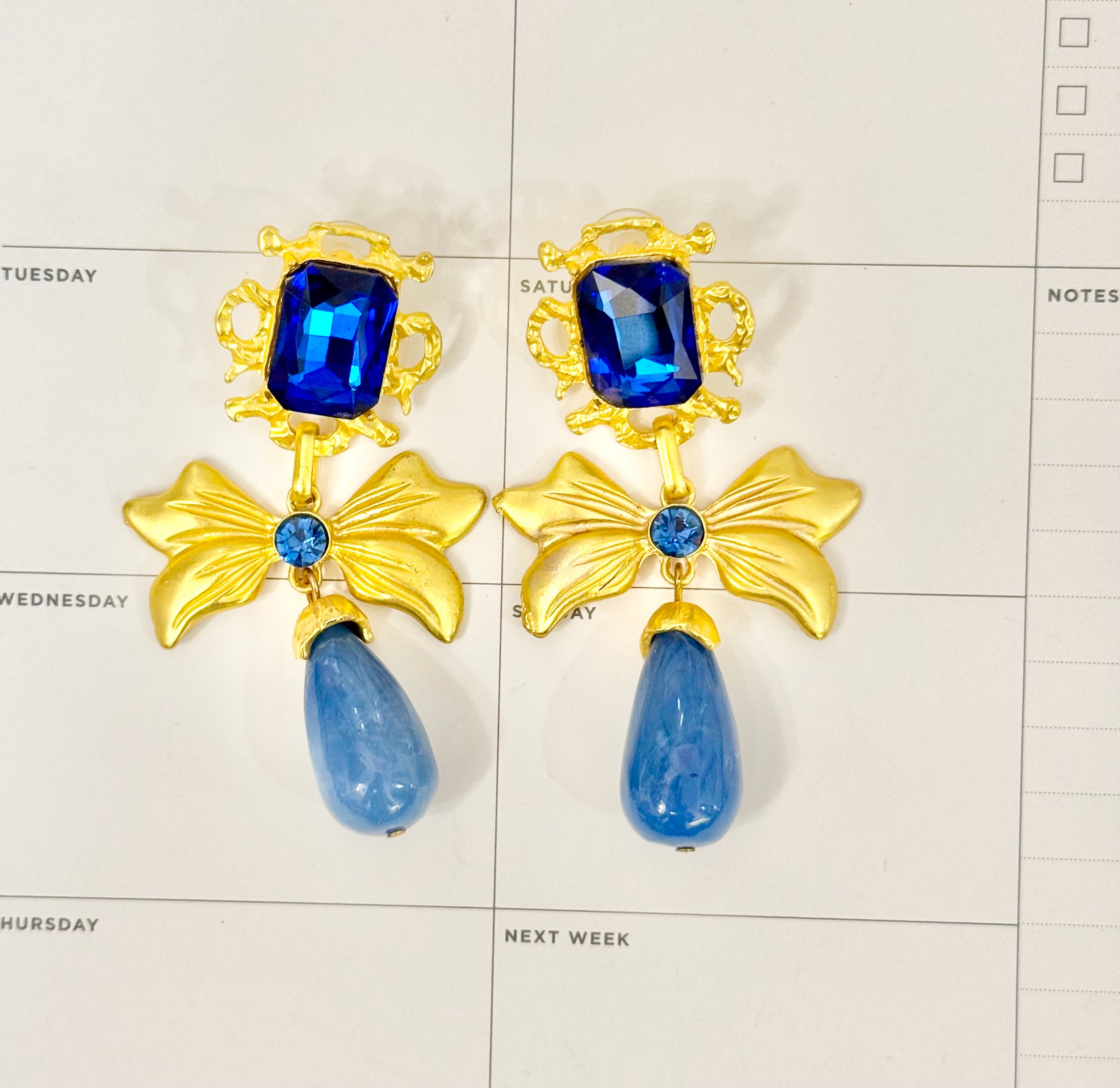 The most preppy sapphire blue bow earrings...