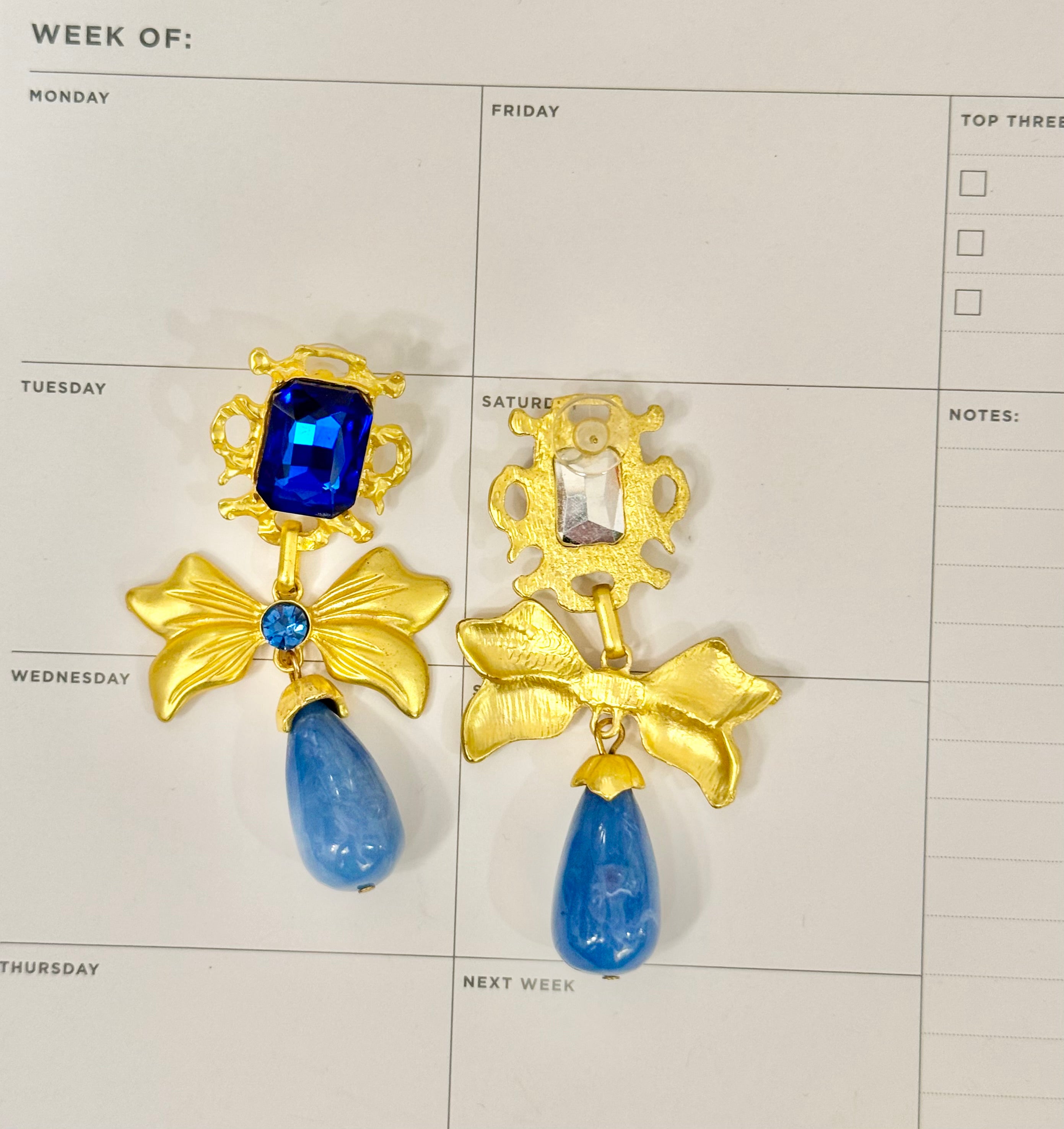 The most preppy sapphire blue bow earrings...