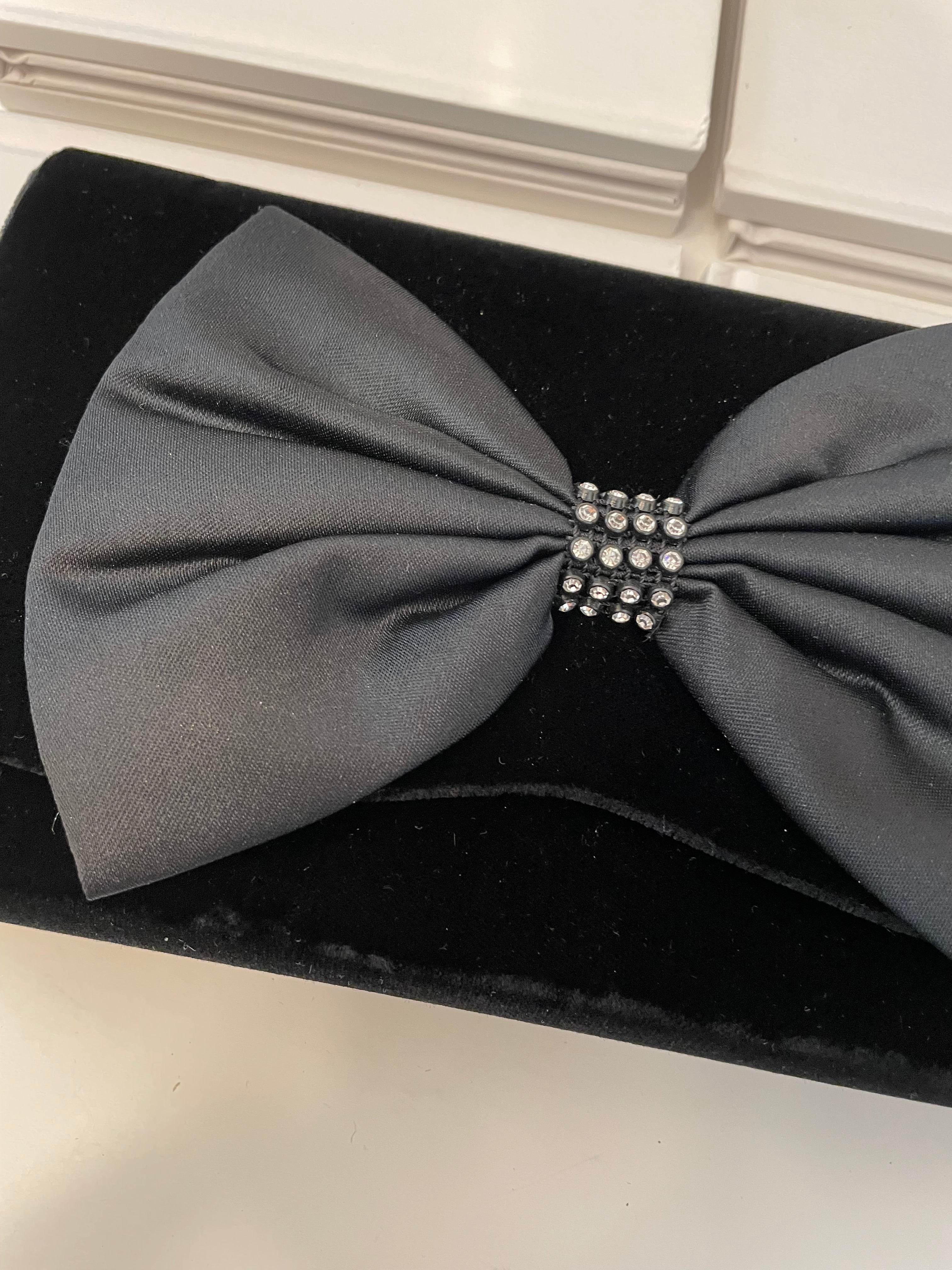 A truly preppy large bow noir velvet evening bag....so classy