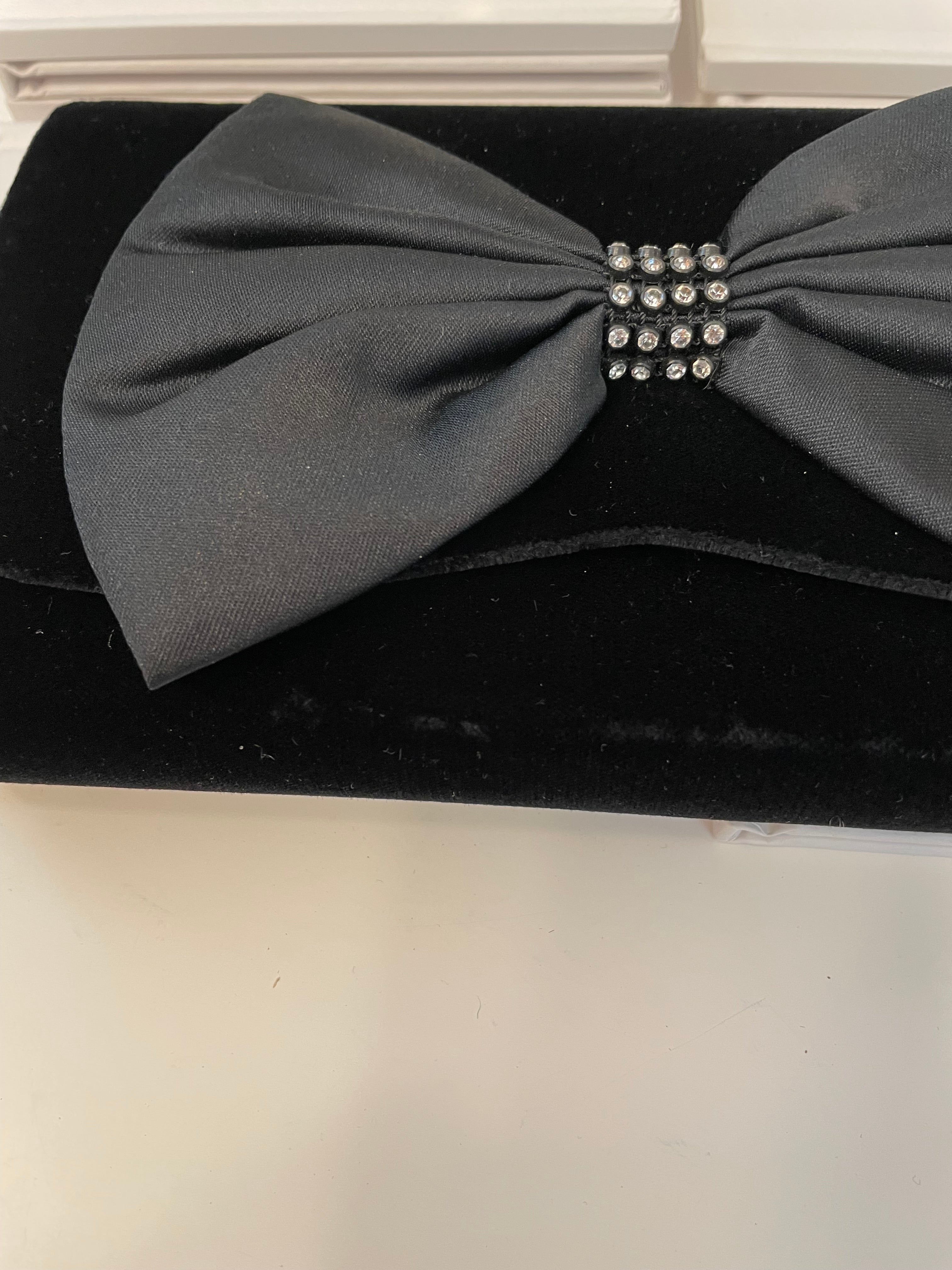 A truly preppy large bow noir velvet evening bag....so classy