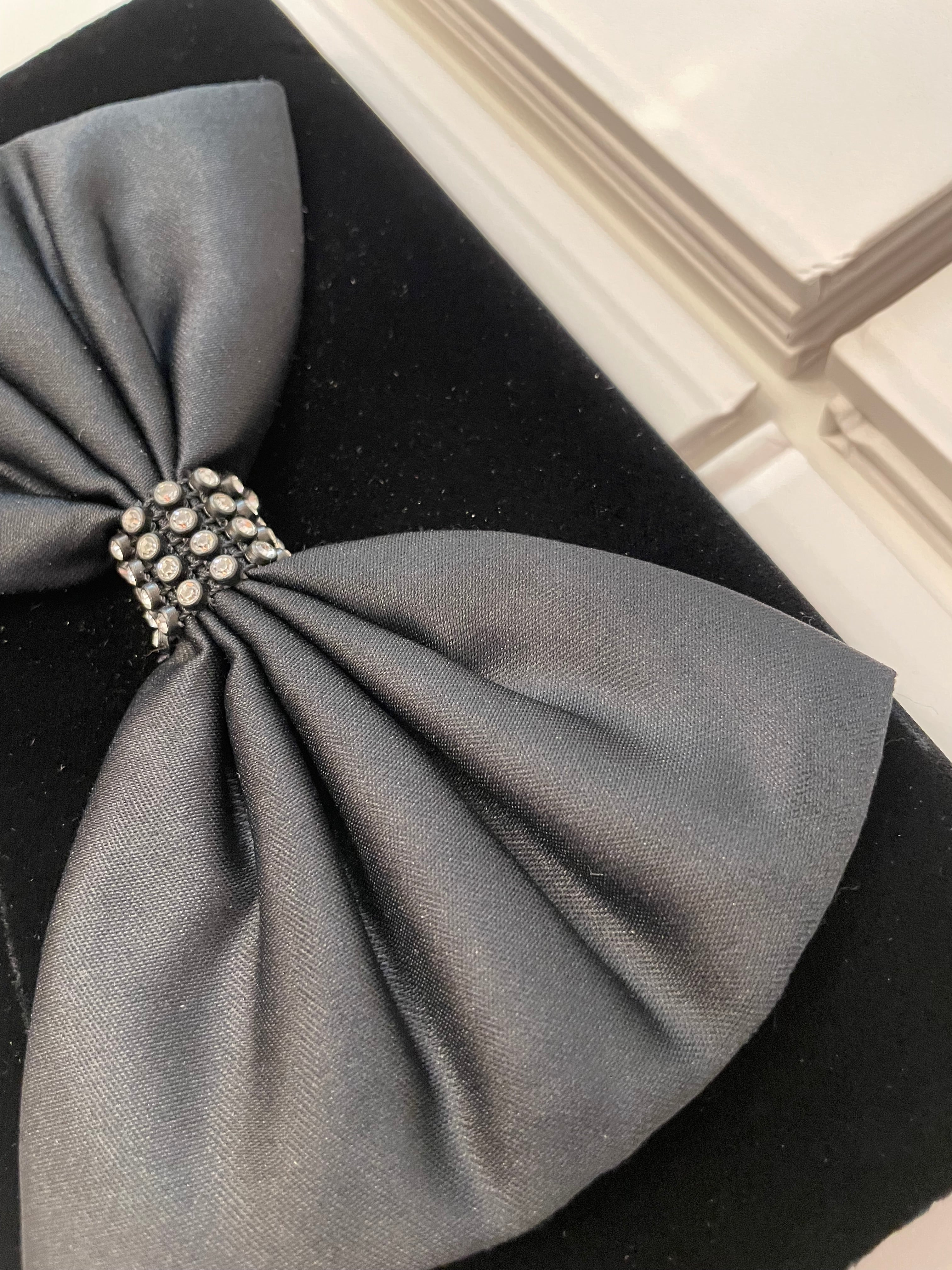 A truly preppy large bow noir velvet evening bag....so classy