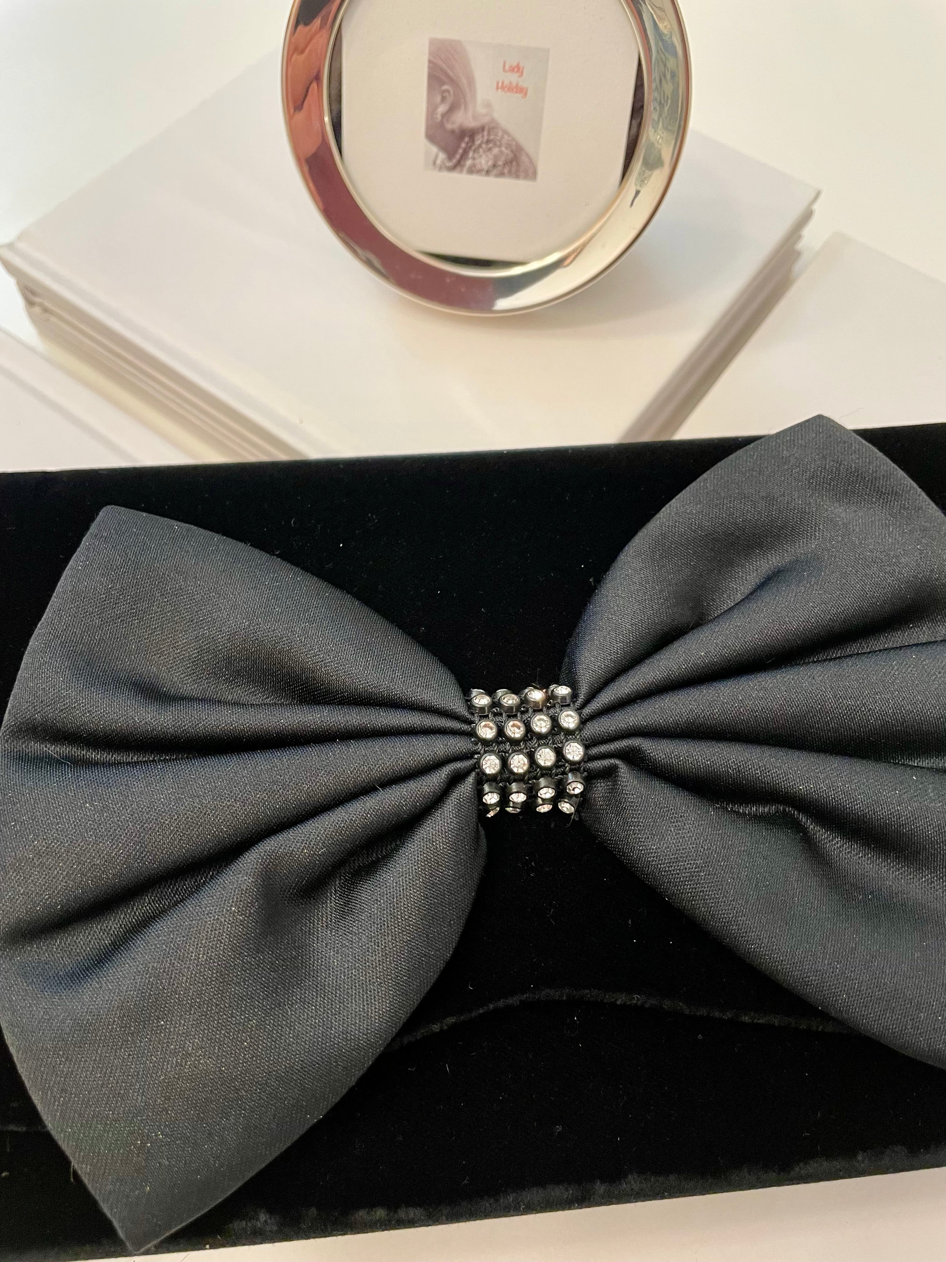 A truly preppy large bow noir velvet evening bag....so classy