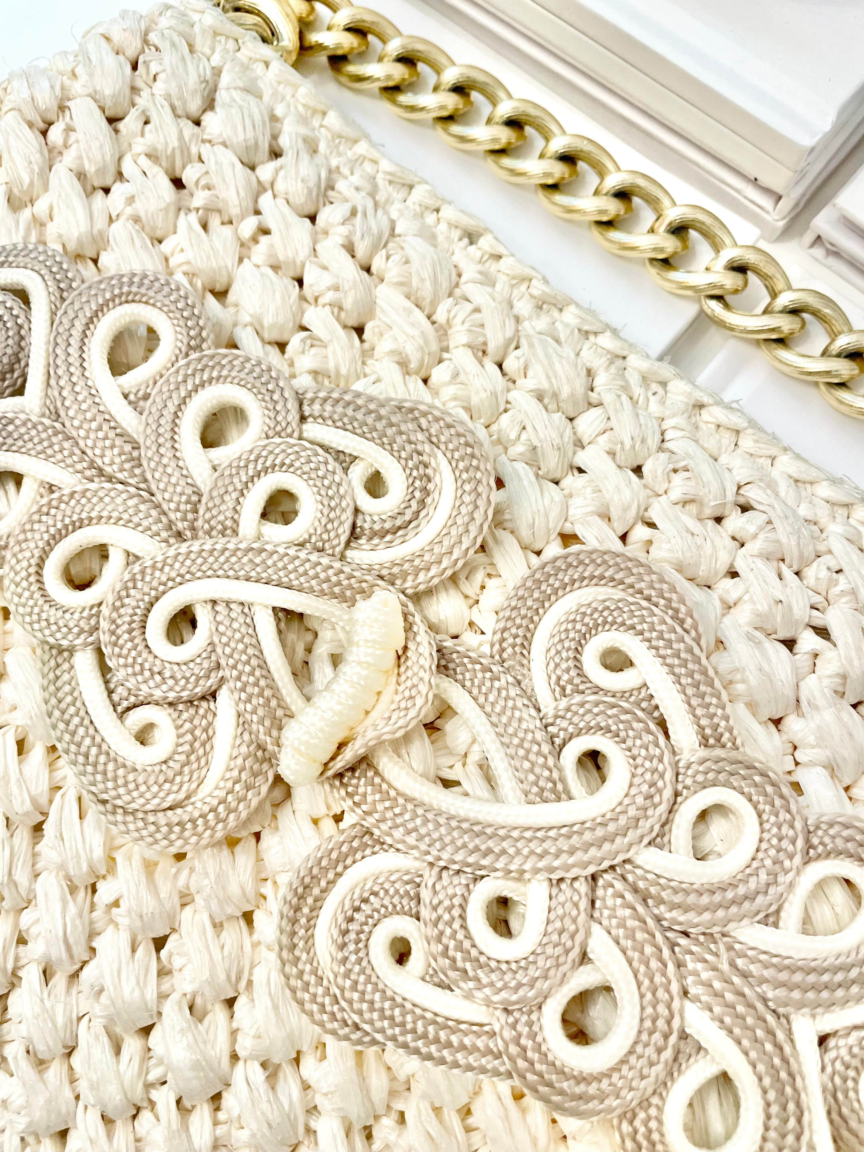 Vintage super sassy 1960's ivory straw bag with a classy gold chain... so elegant.
