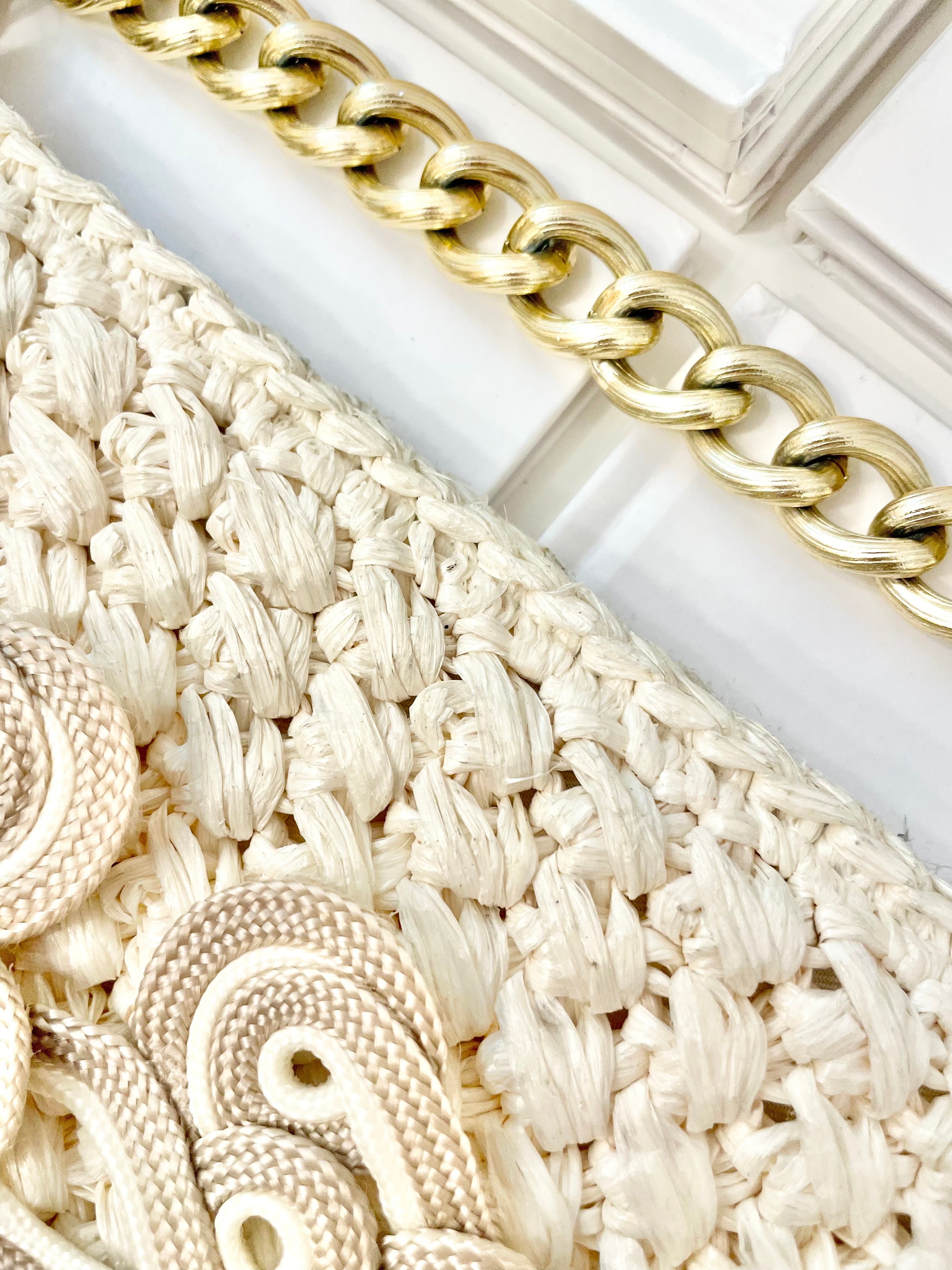 Vintage super sassy 1960's ivory straw bag with a classy gold chain... so elegant.