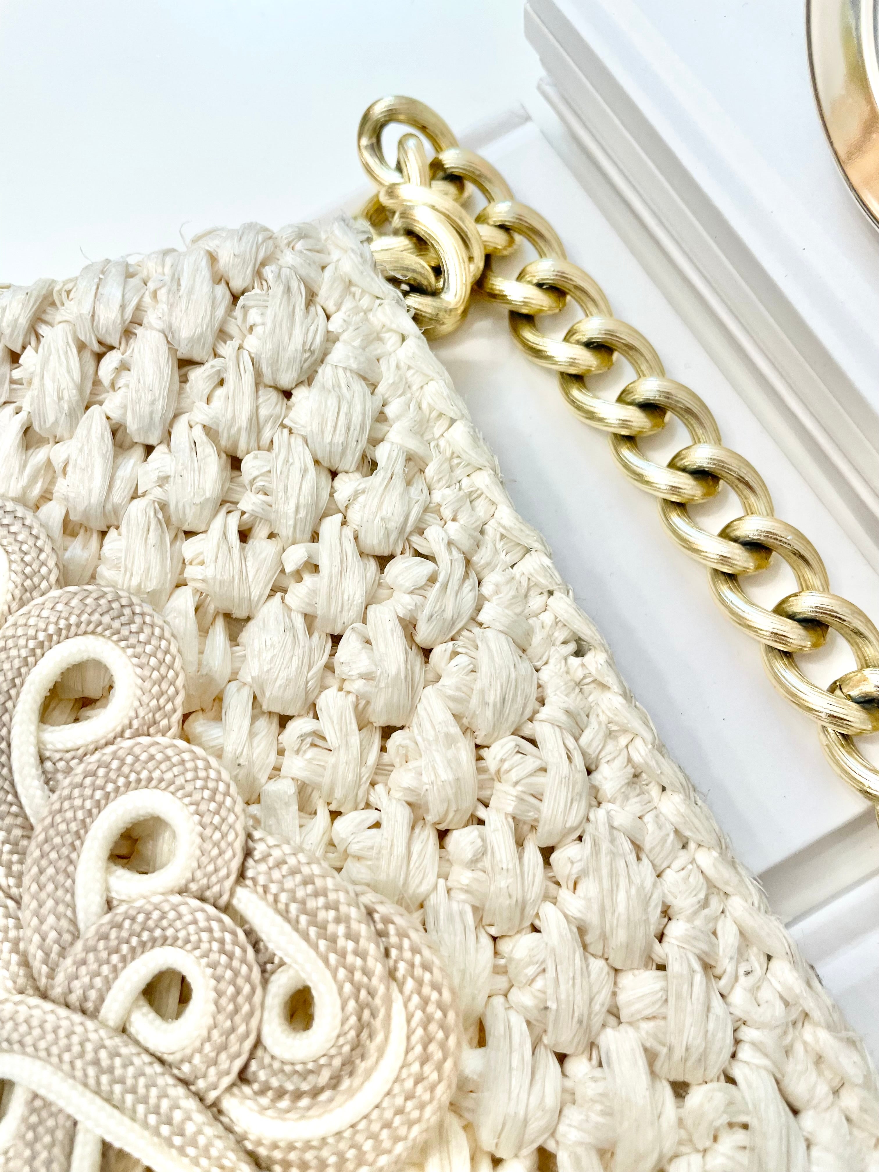 Vintage super sassy 1960's ivory straw bag with a classy gold chain... so elegant.