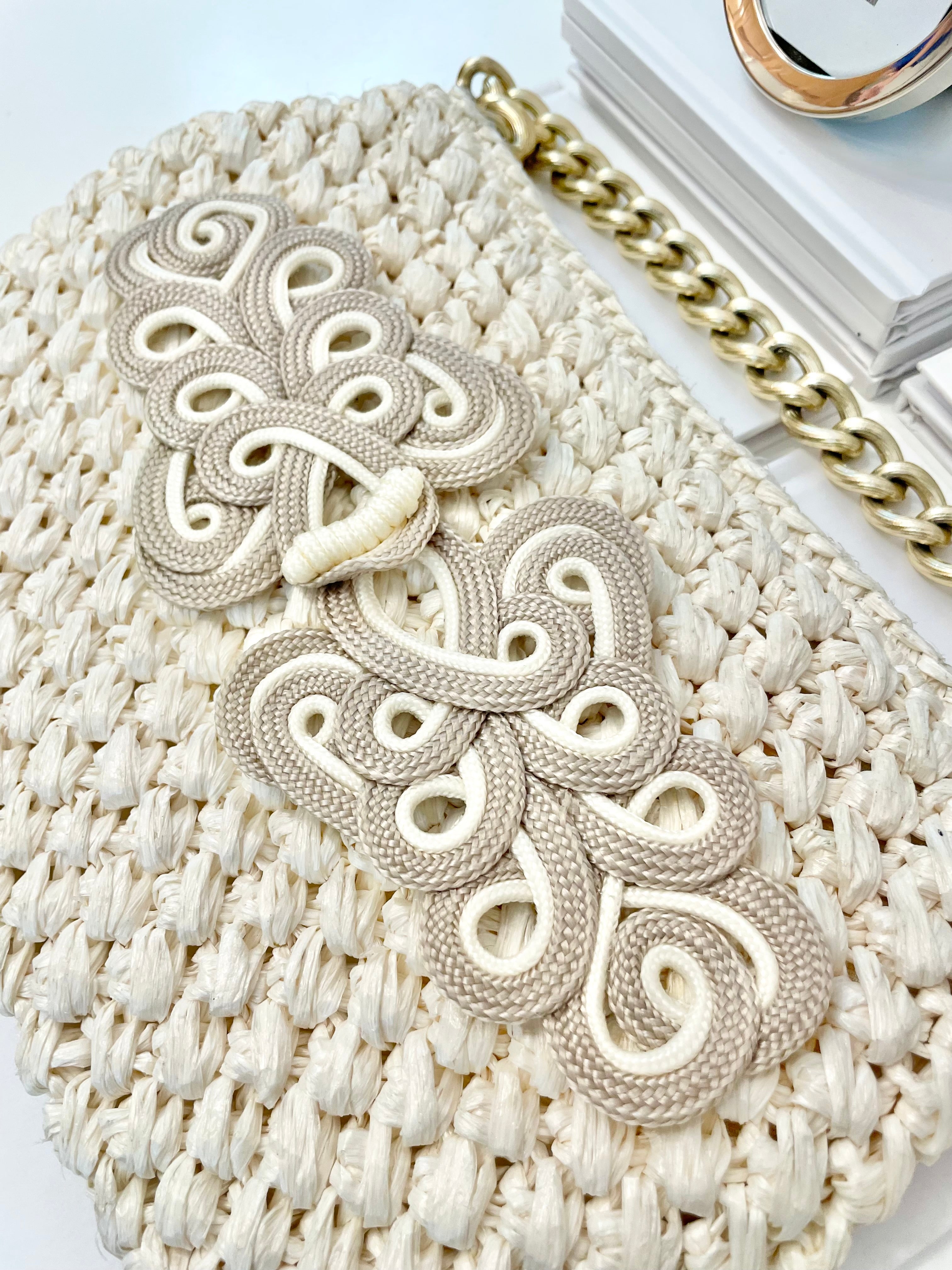 Vintage super sassy 1960's ivory straw bag with a classy gold chain... so elegant.