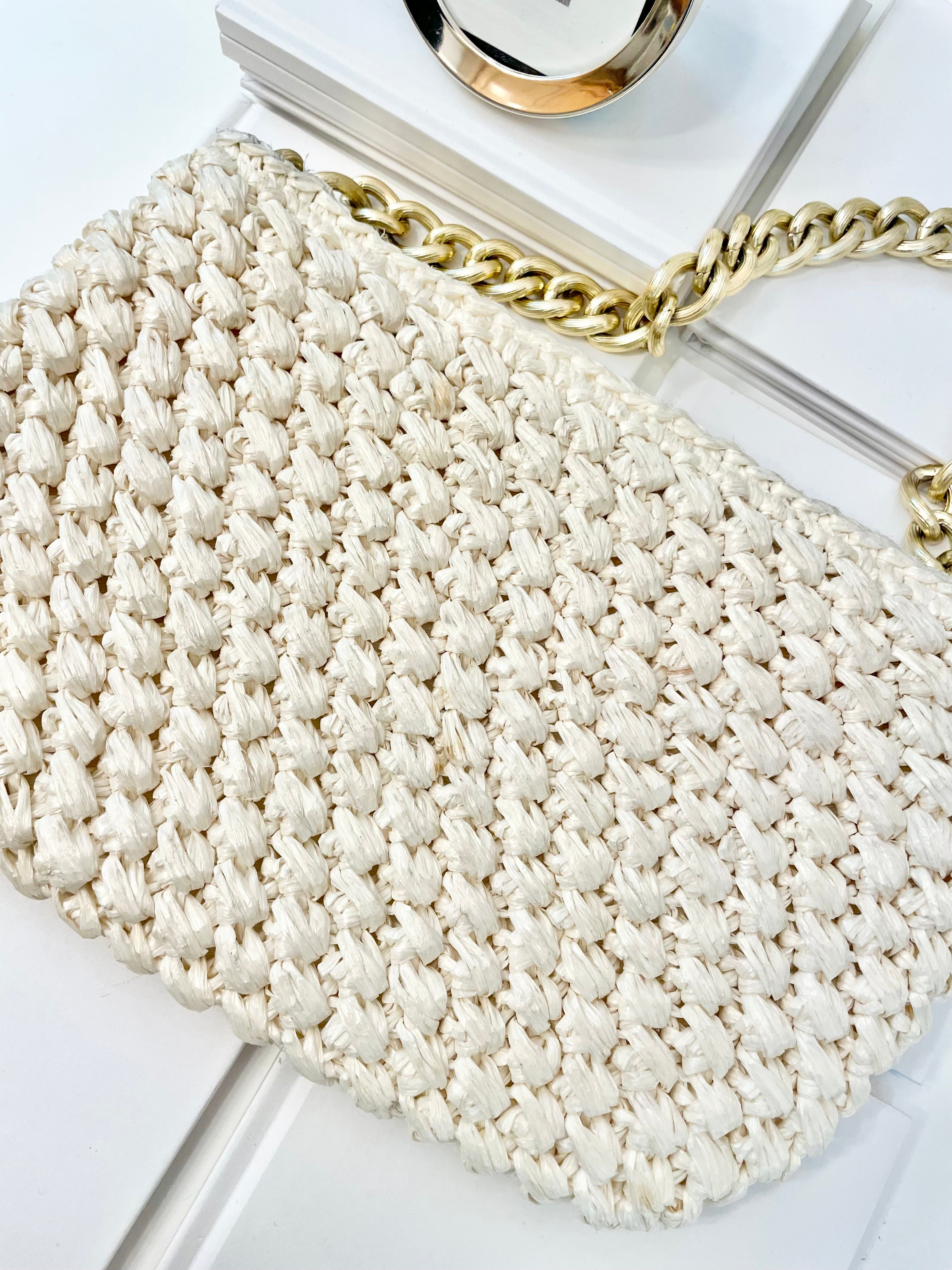 Vintage super sassy 1960's ivory straw bag with a classy gold chain... so elegant.