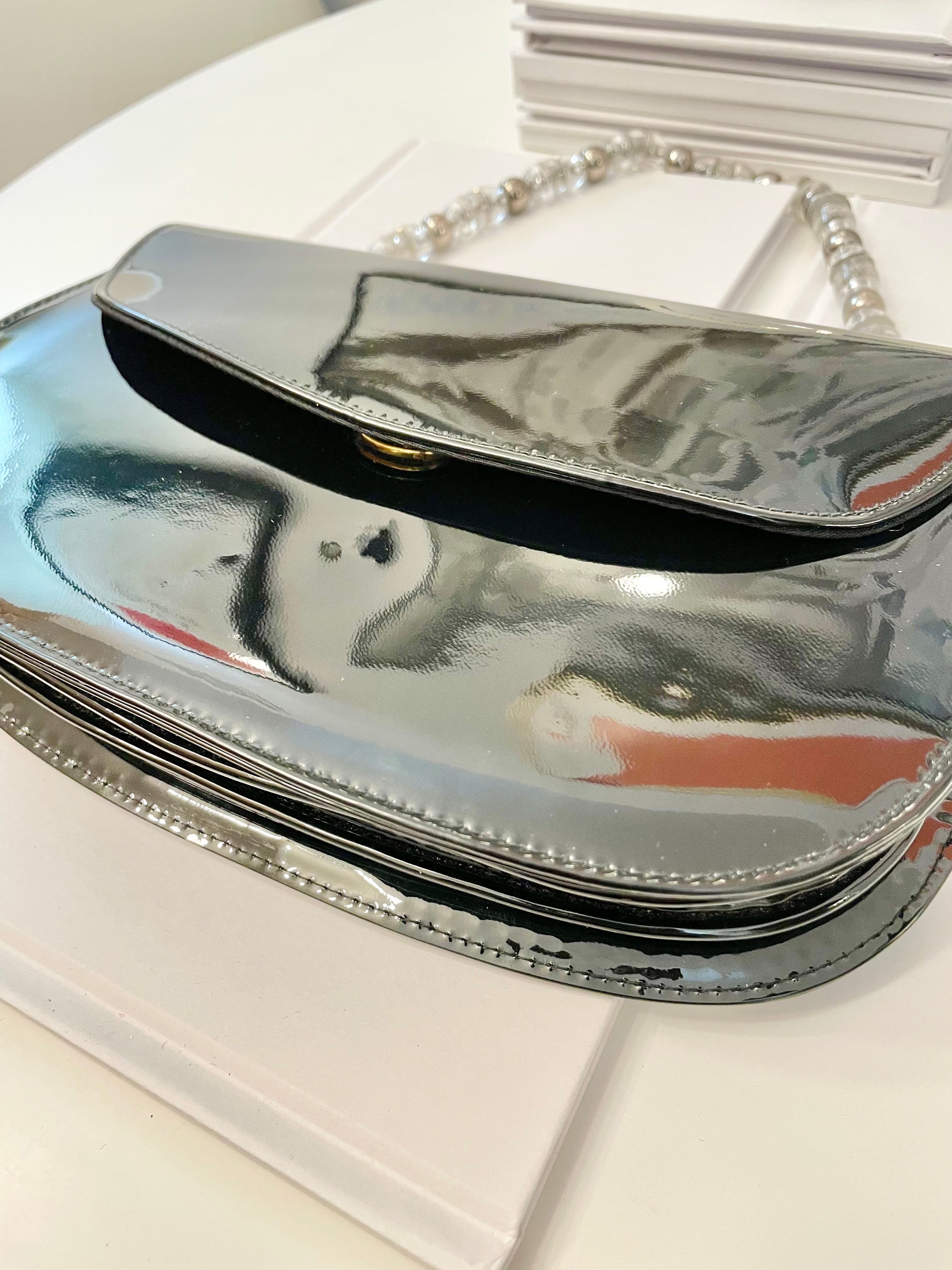 Truly classic faux patent leather, and lucite handle ladies purse... so classy!