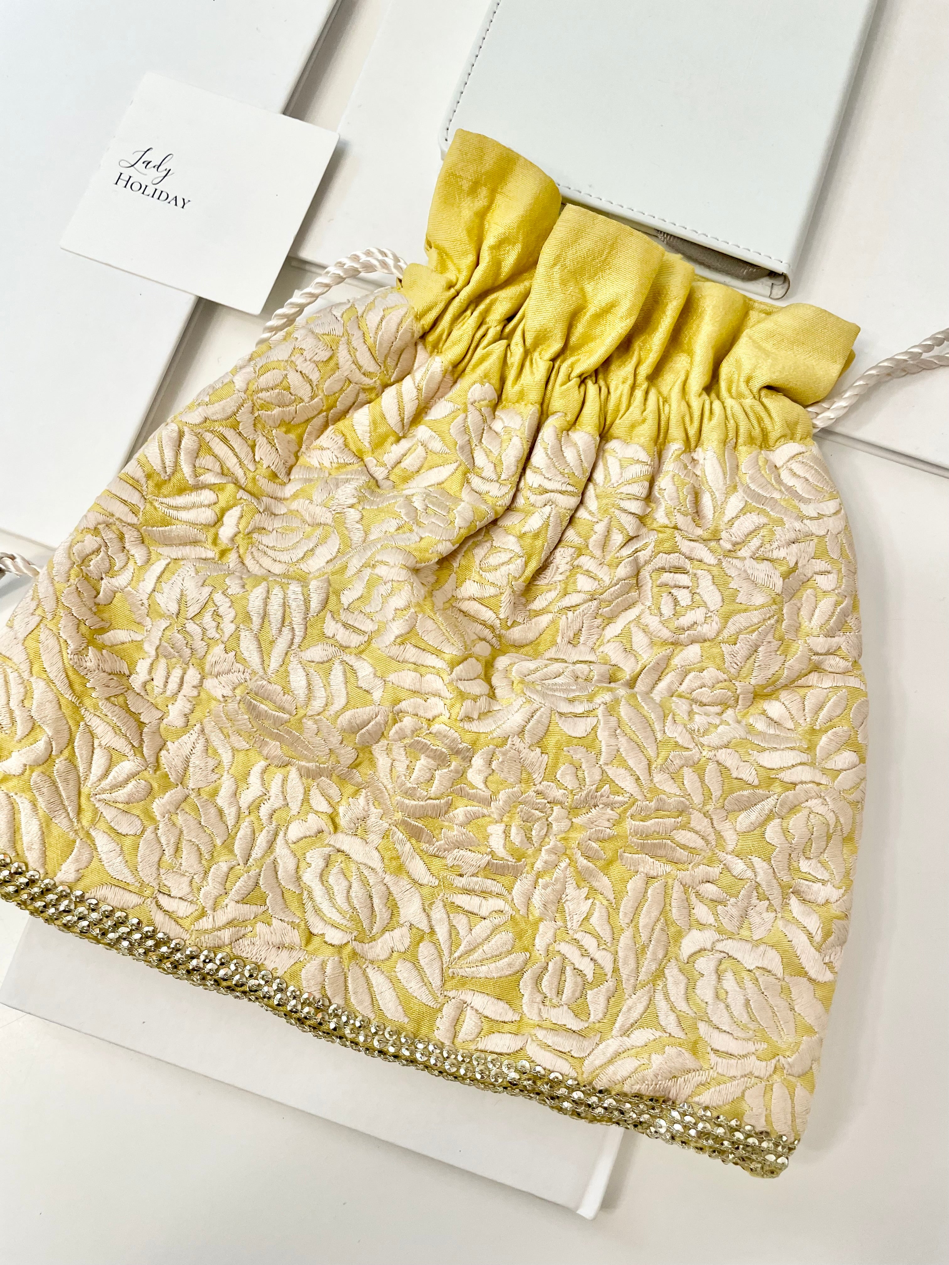 The Cheeky Mistress, and her love of the unusual.. this 1970's silk clutch bag is so elegant!