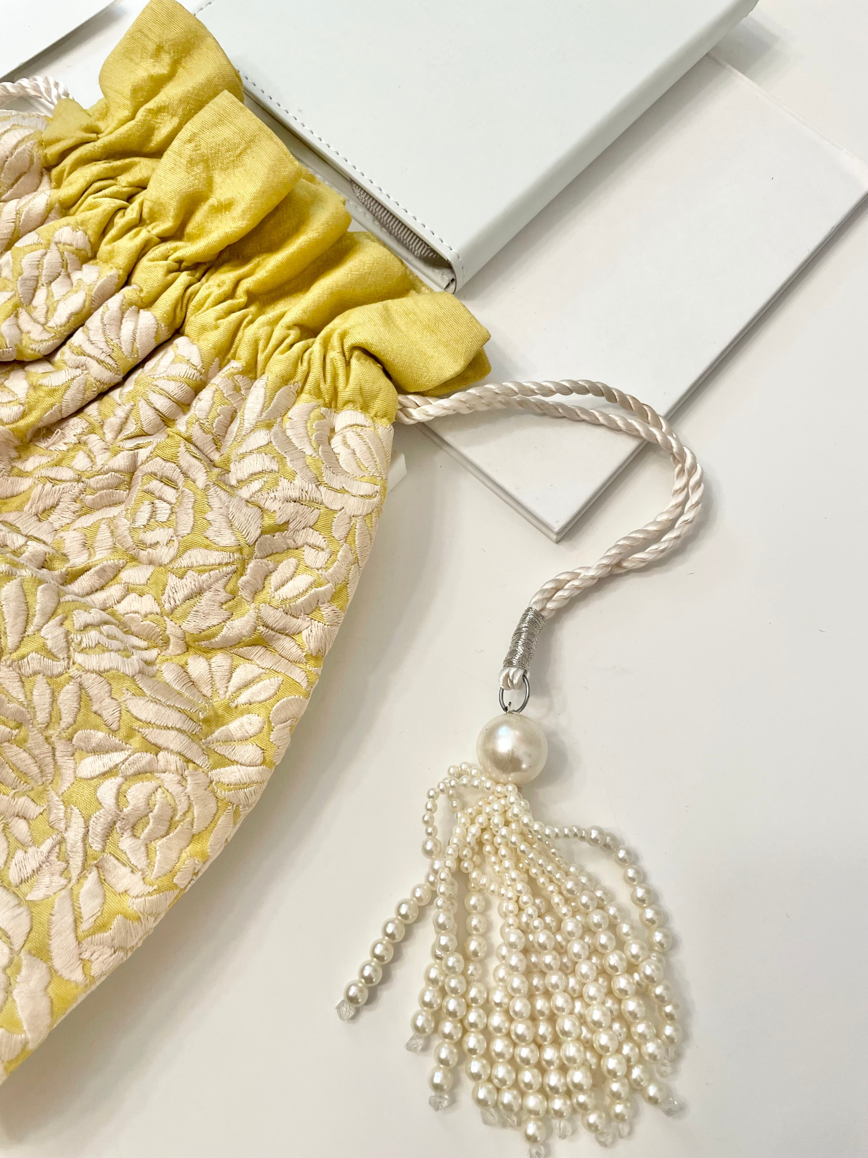 The Cheeky Mistress, and her love of the unusual.. this 1970's silk clutch bag is so elegant!