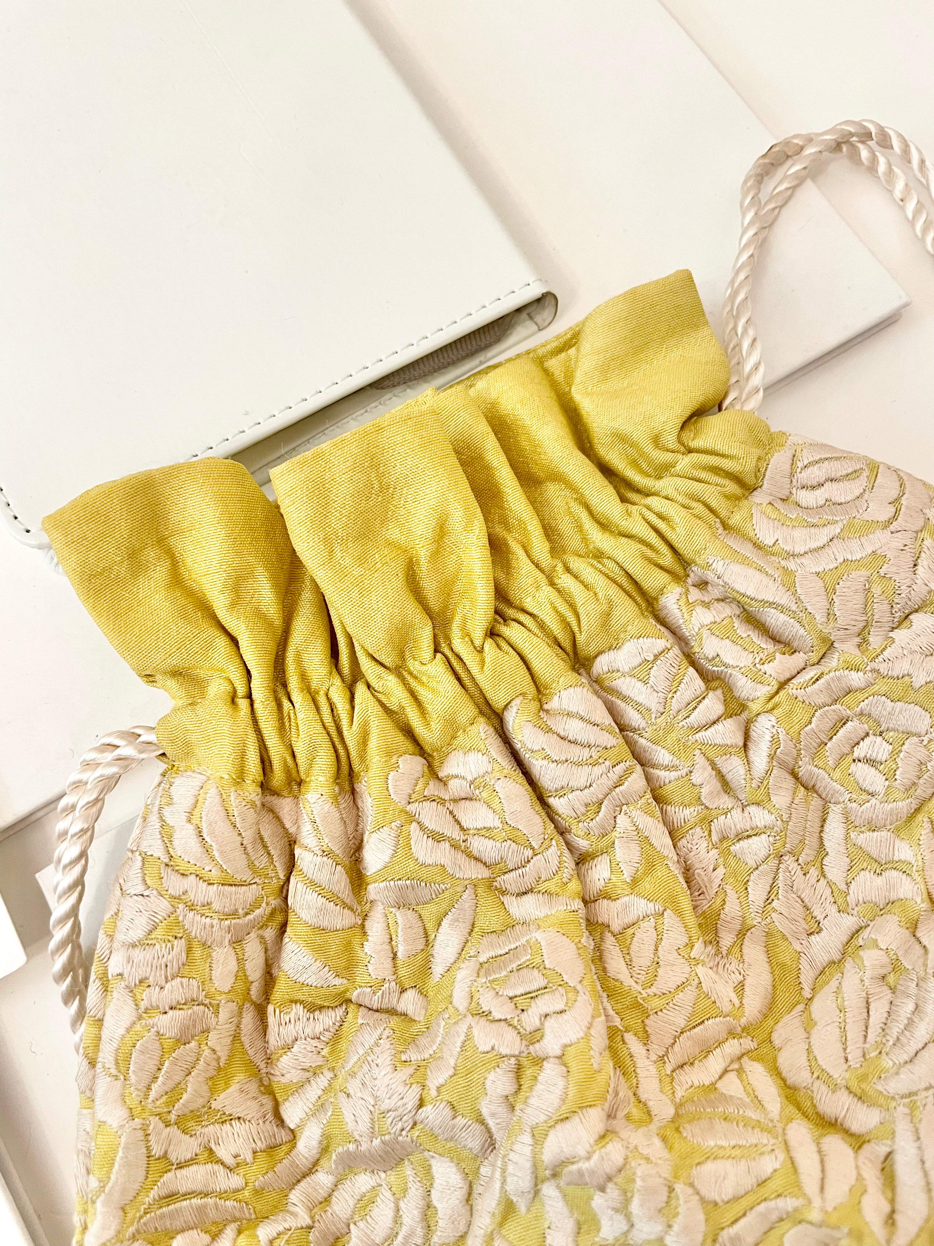The Cheeky Mistress, and her love of the unusual.. this 1970's silk clutch bag is so elegant!