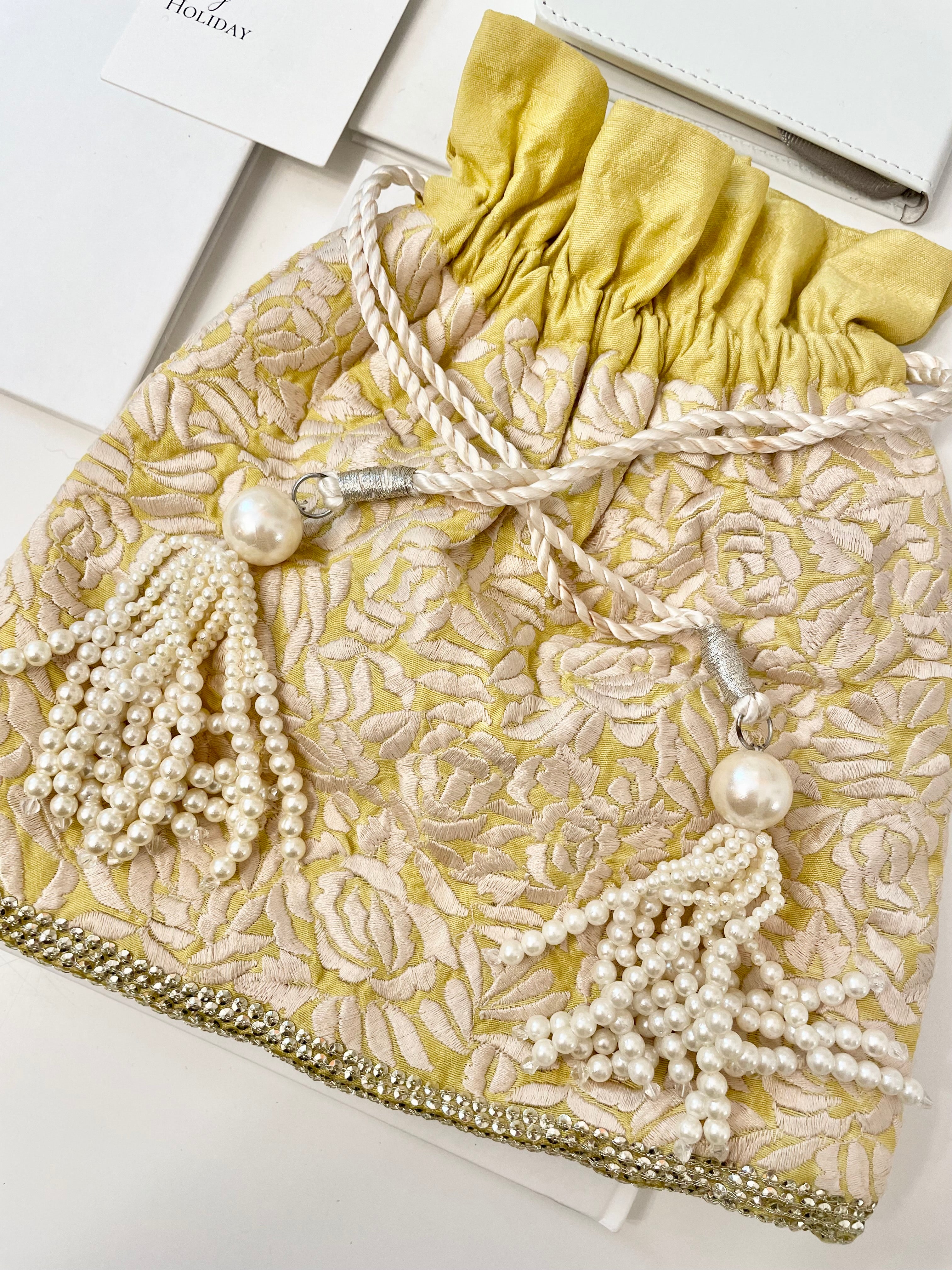 The Cheeky Mistress, and her love of the unusual.. this 1970's silk clutch bag is so elegant!