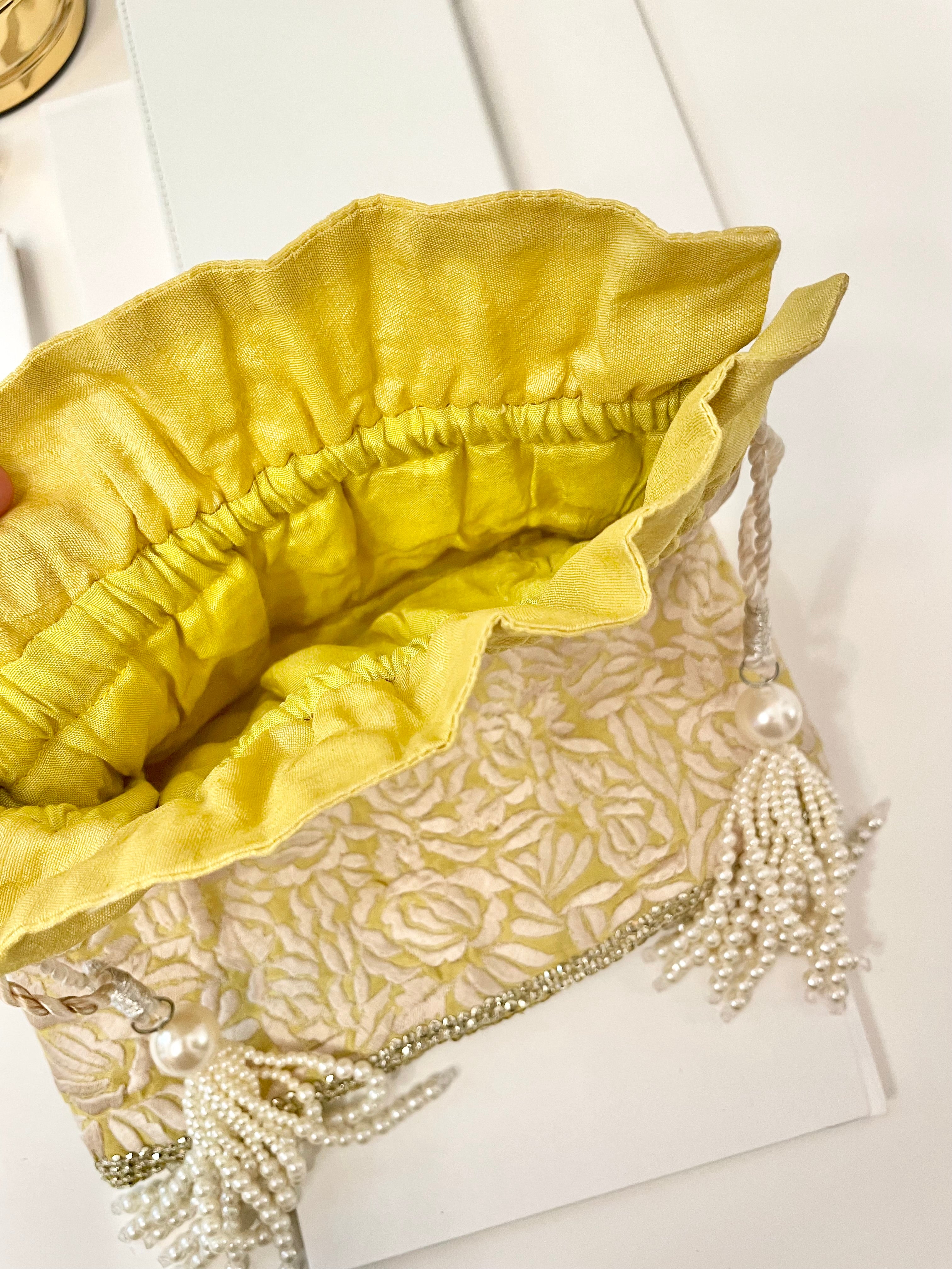 The Cheeky Mistress, and her love of the unusual.. this 1970's silk clutch bag is so elegant!