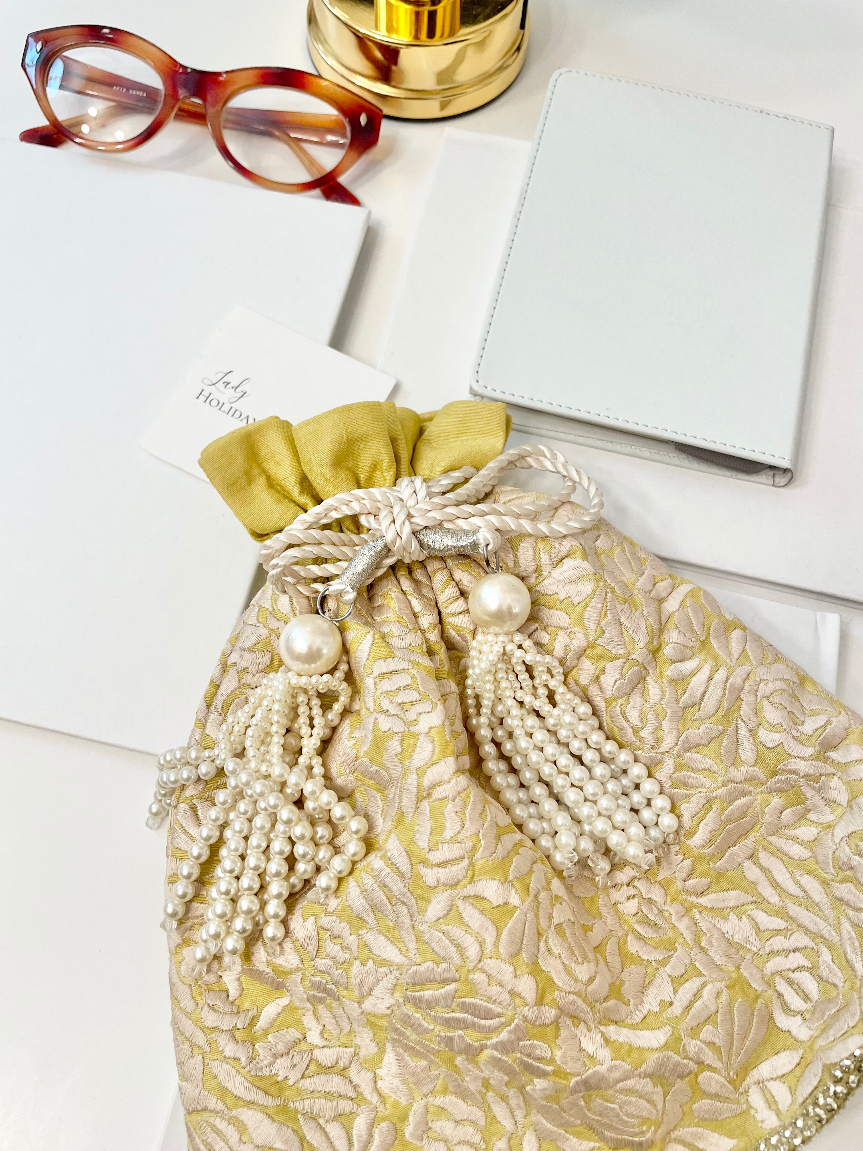 The Cheeky Mistress, and her love of the unusual.. this 1970's silk clutch bag is so elegant!