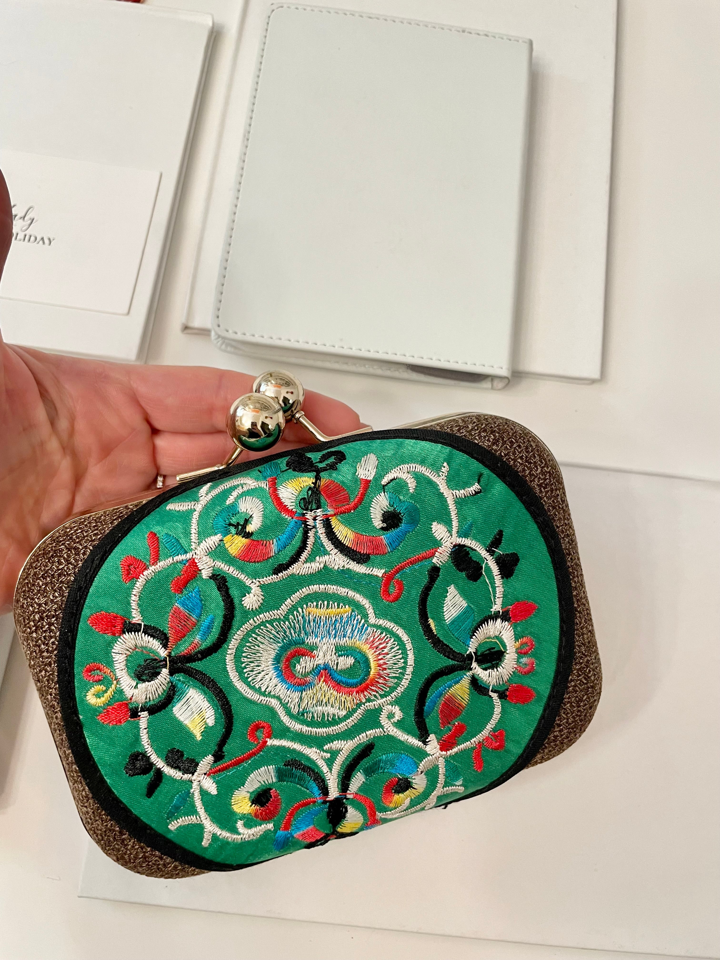 The Happy Hostess loves anything colorful.. this petite clutch bag is colorful, and super chic!