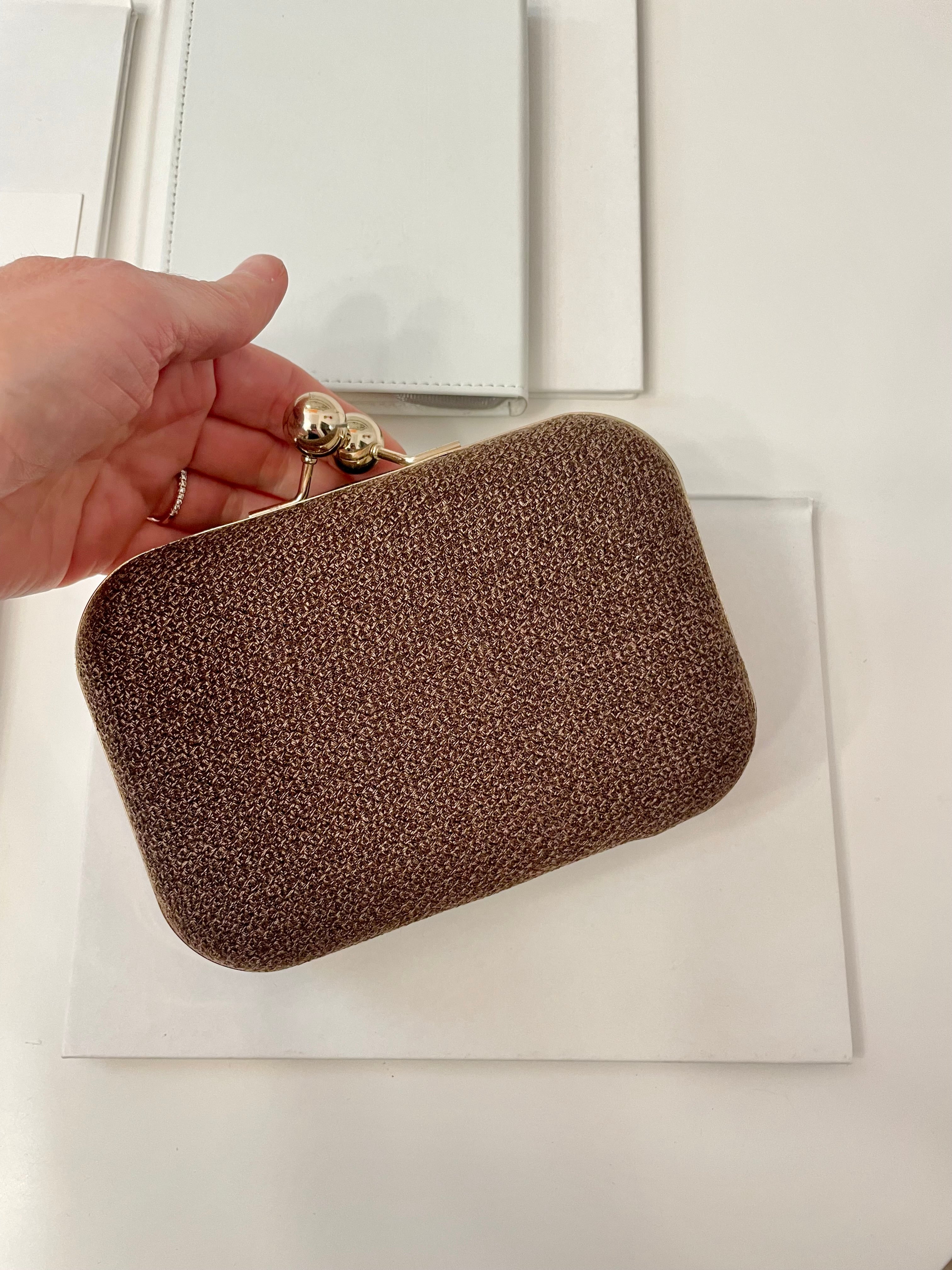 The Happy Hostess loves anything colorful.. this petite clutch bag is colorful, and super chic!