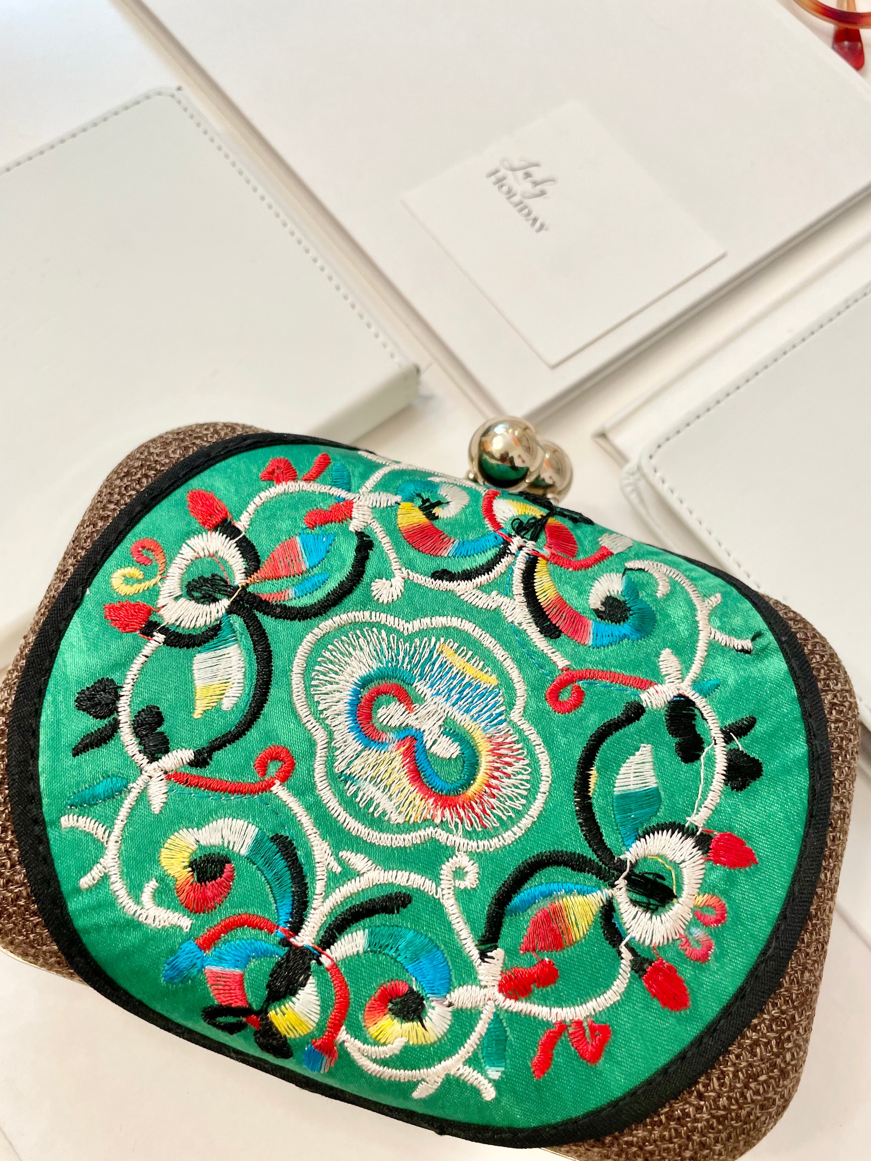 The Happy Hostess loves anything colorful.. this petite clutch bag is colorful, and super chic!