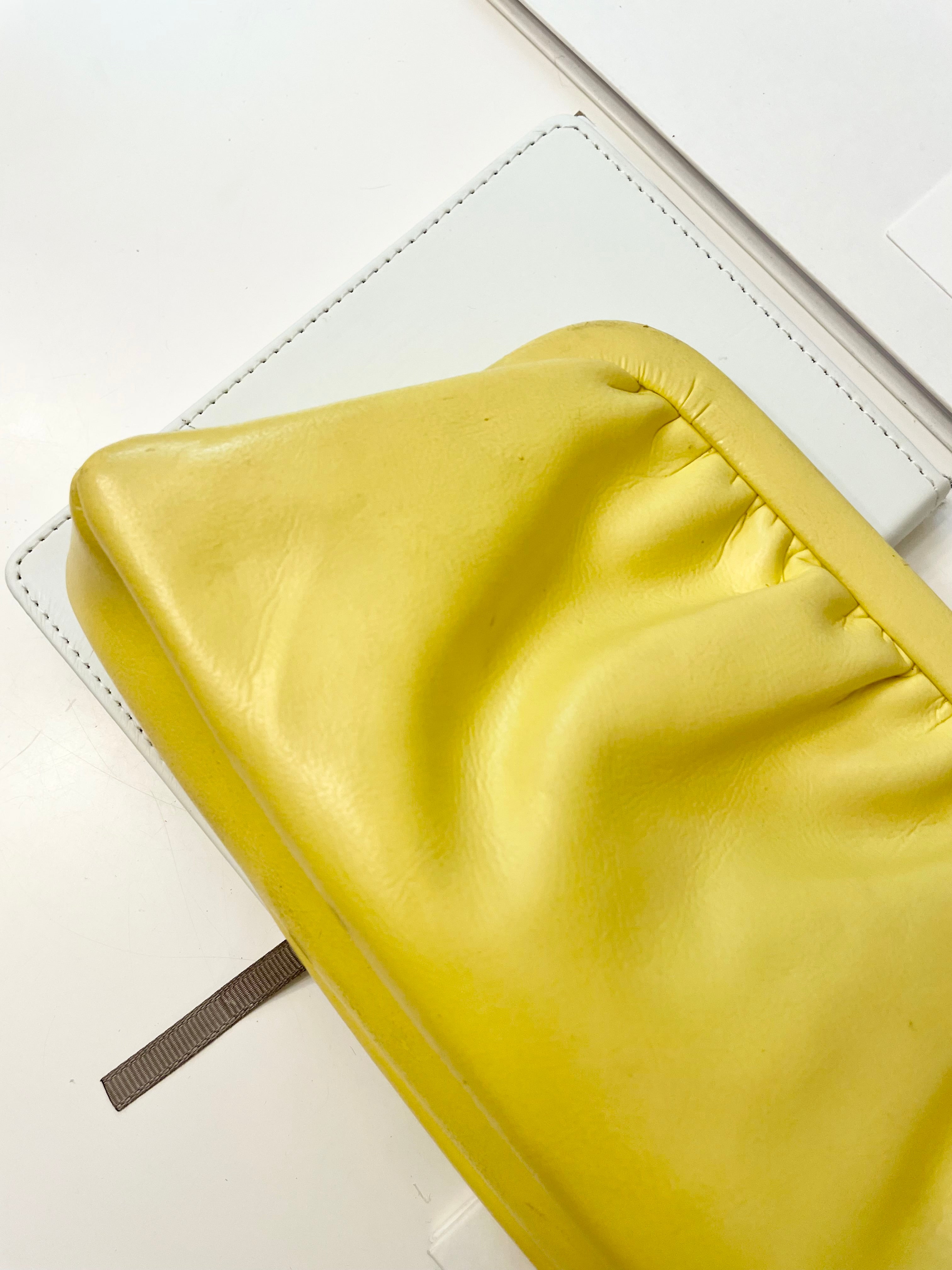 The Cocktail hour bag... so chic. This 1960's bright yellow long clutch bag, is exactly the perfect bag for ladies night with the gals!