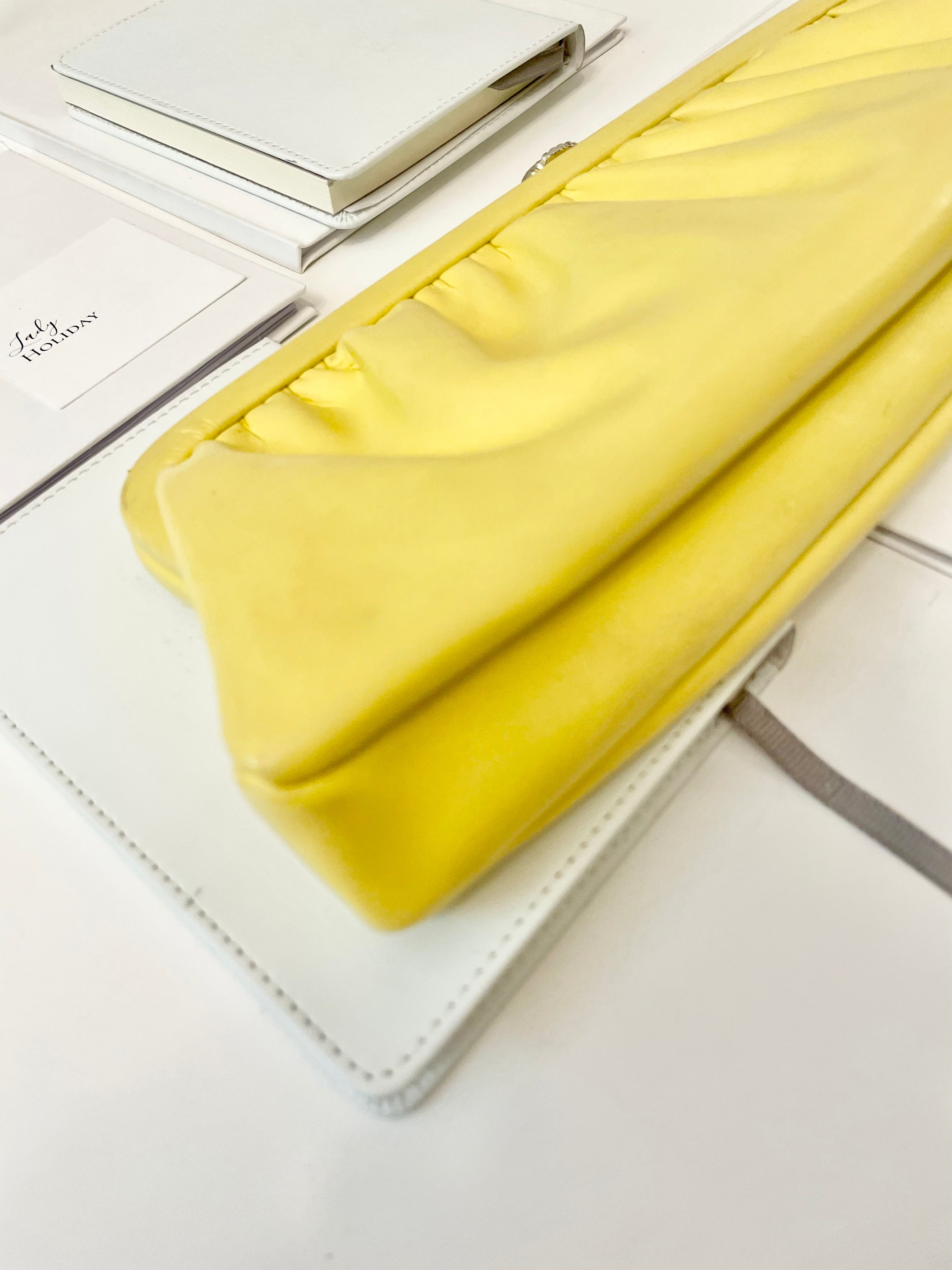 The Cocktail hour bag... so chic. This 1960's bright yellow long clutch bag, is exactly the perfect bag for ladies night with the gals!