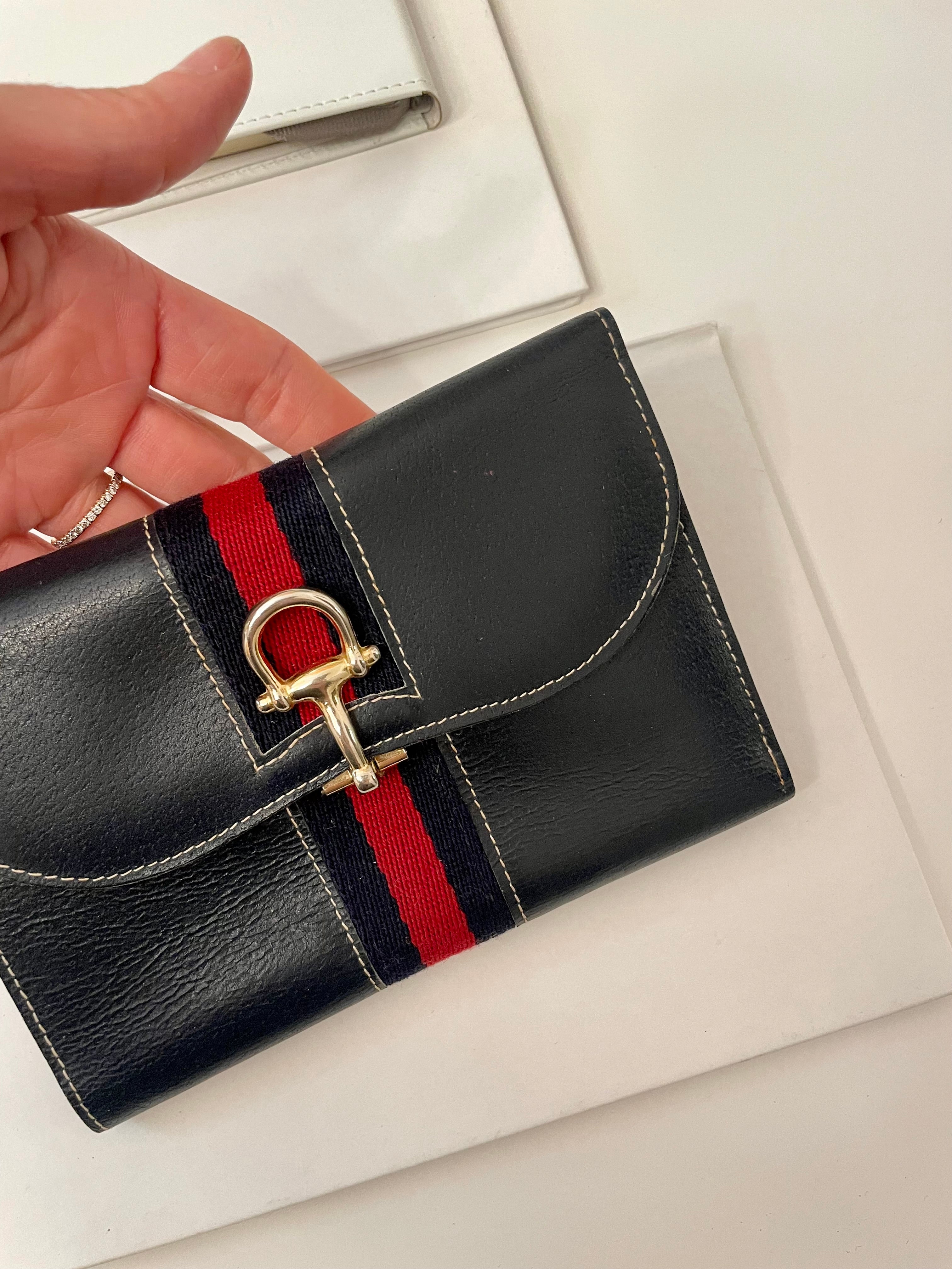 The Preppy Girl Society... they love the classic navy, and red story... This wallet brings their love for that color palette to whole new level!