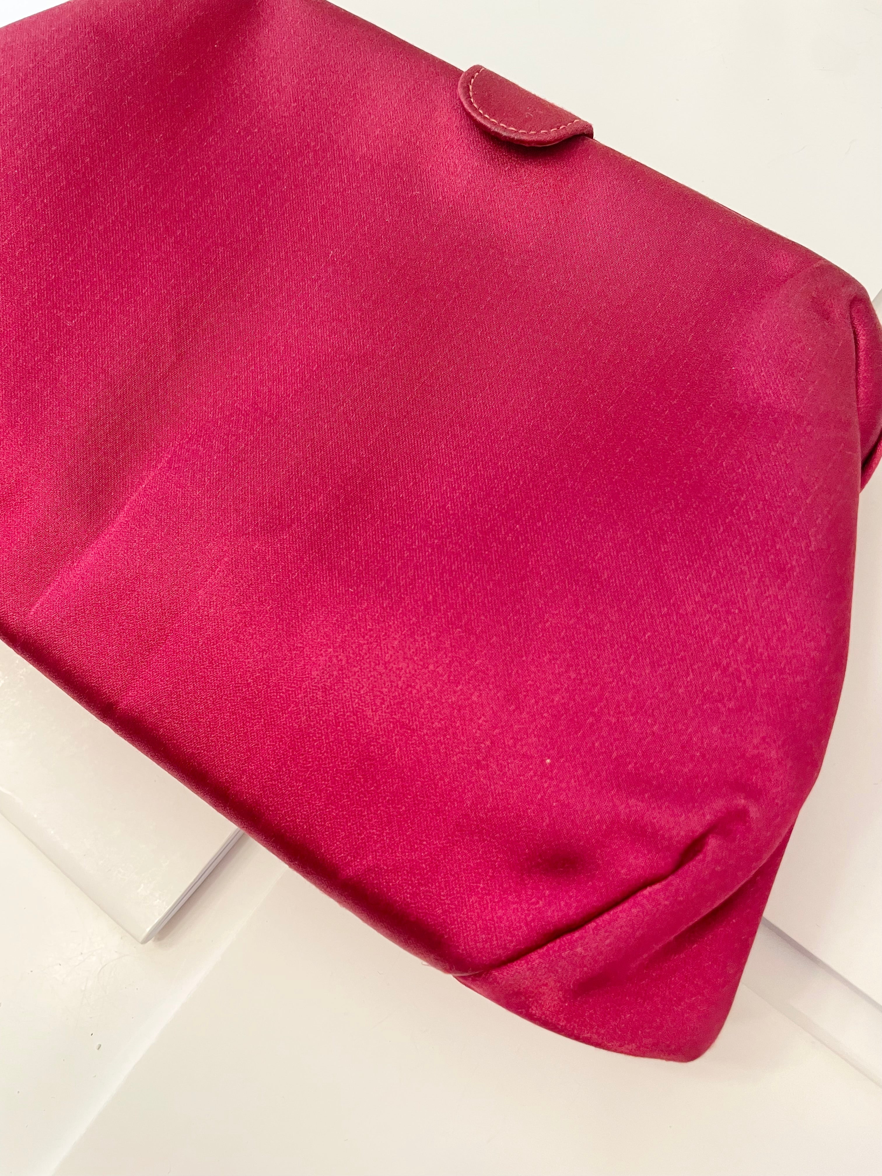 The most chic magenta satin and silk clutch bag.... the color is so rich