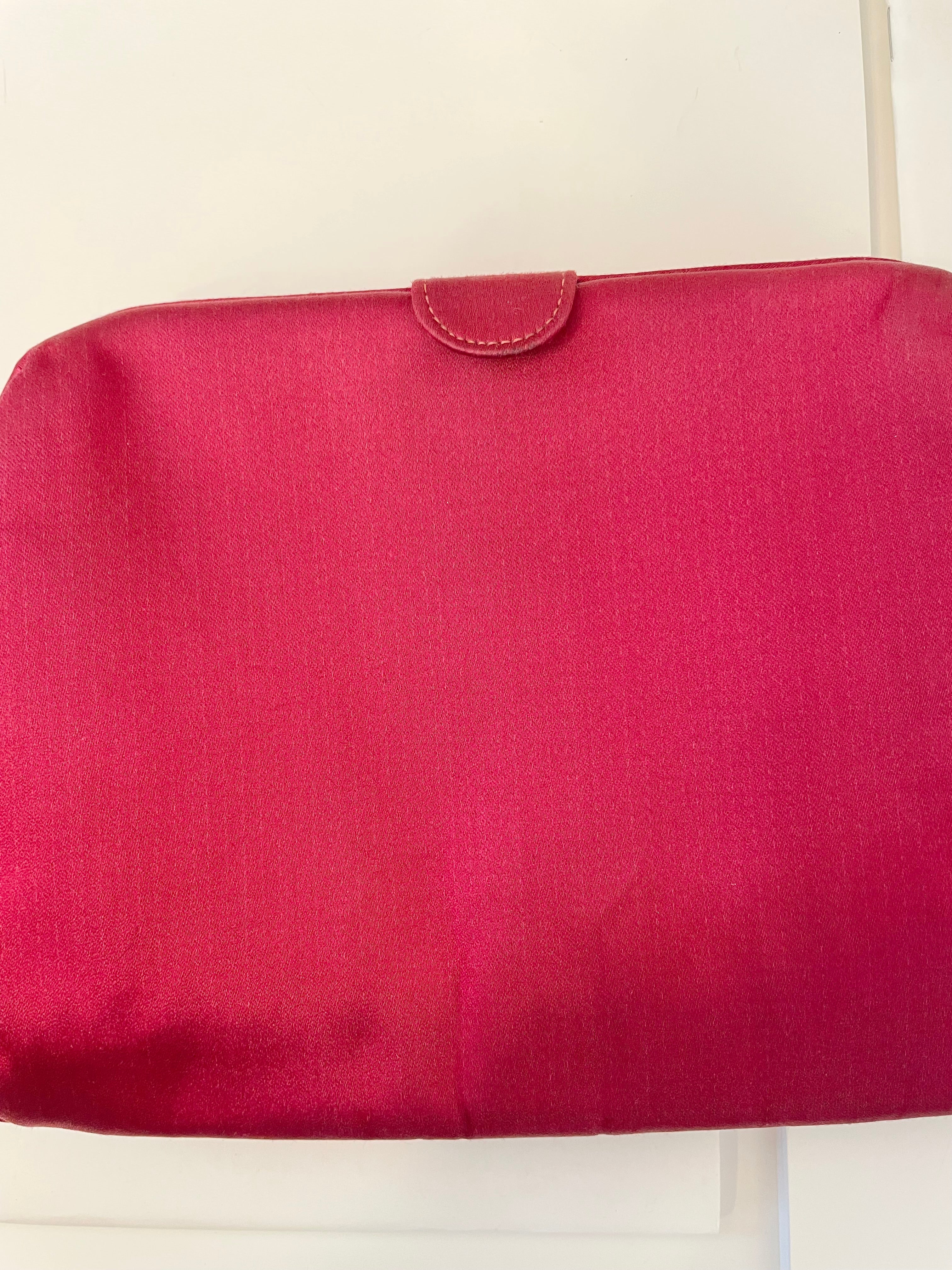 The most chic magenta satin and silk clutch bag.... the color is so rich