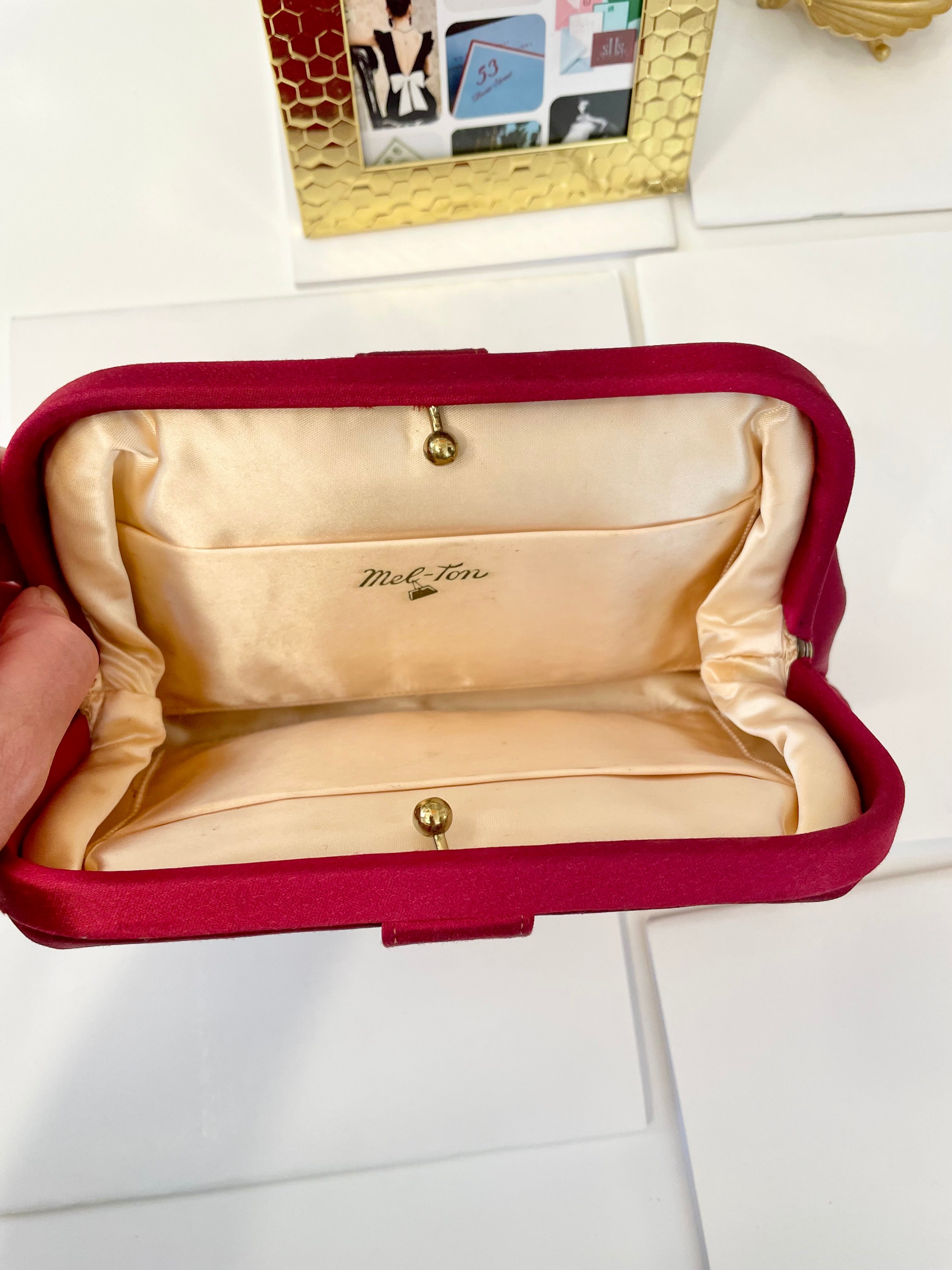 The most chic magenta satin and silk clutch bag.... the color is so rich