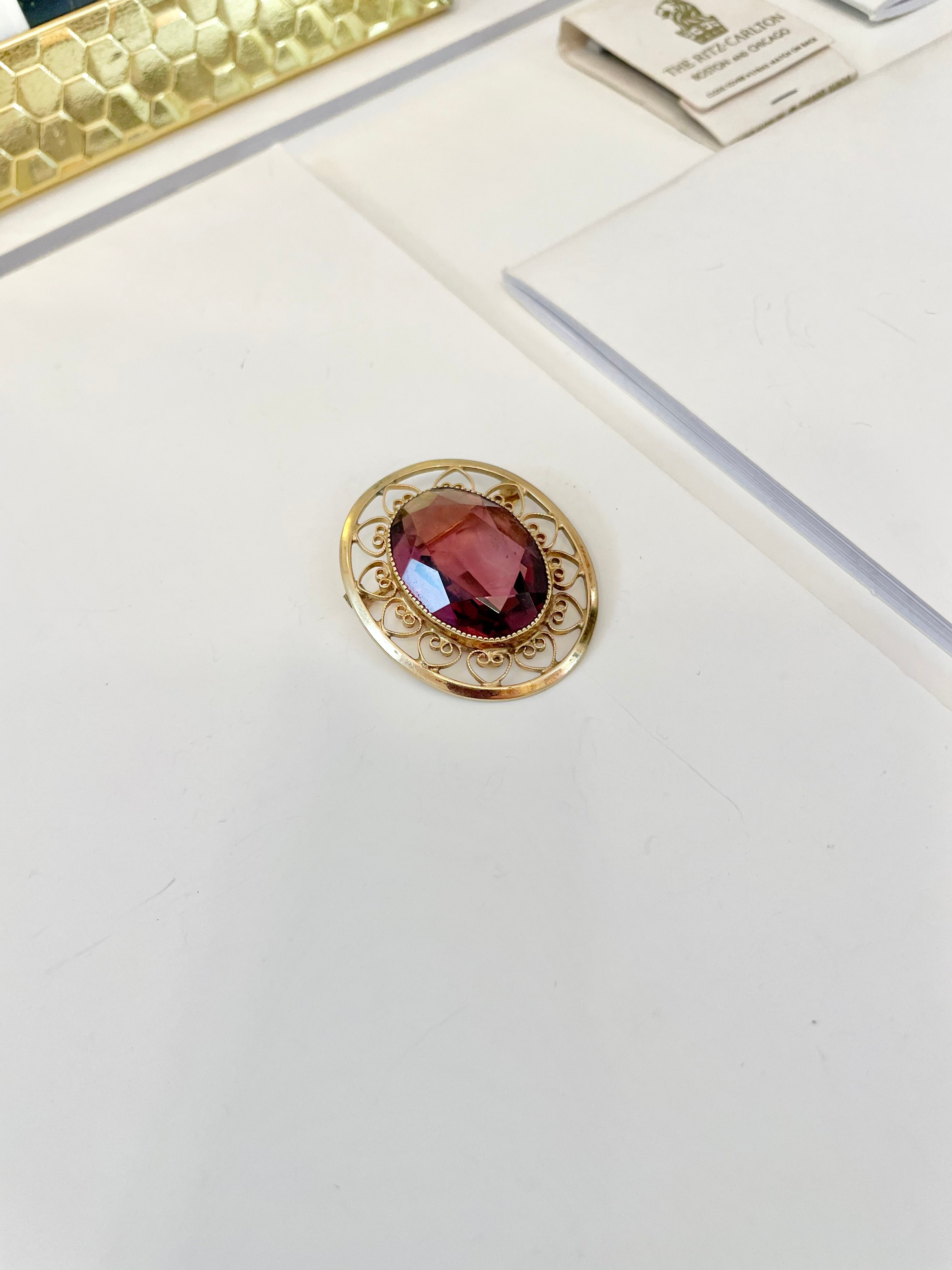 1950's gold genuine amethyst elegant brooch.... so lovely.