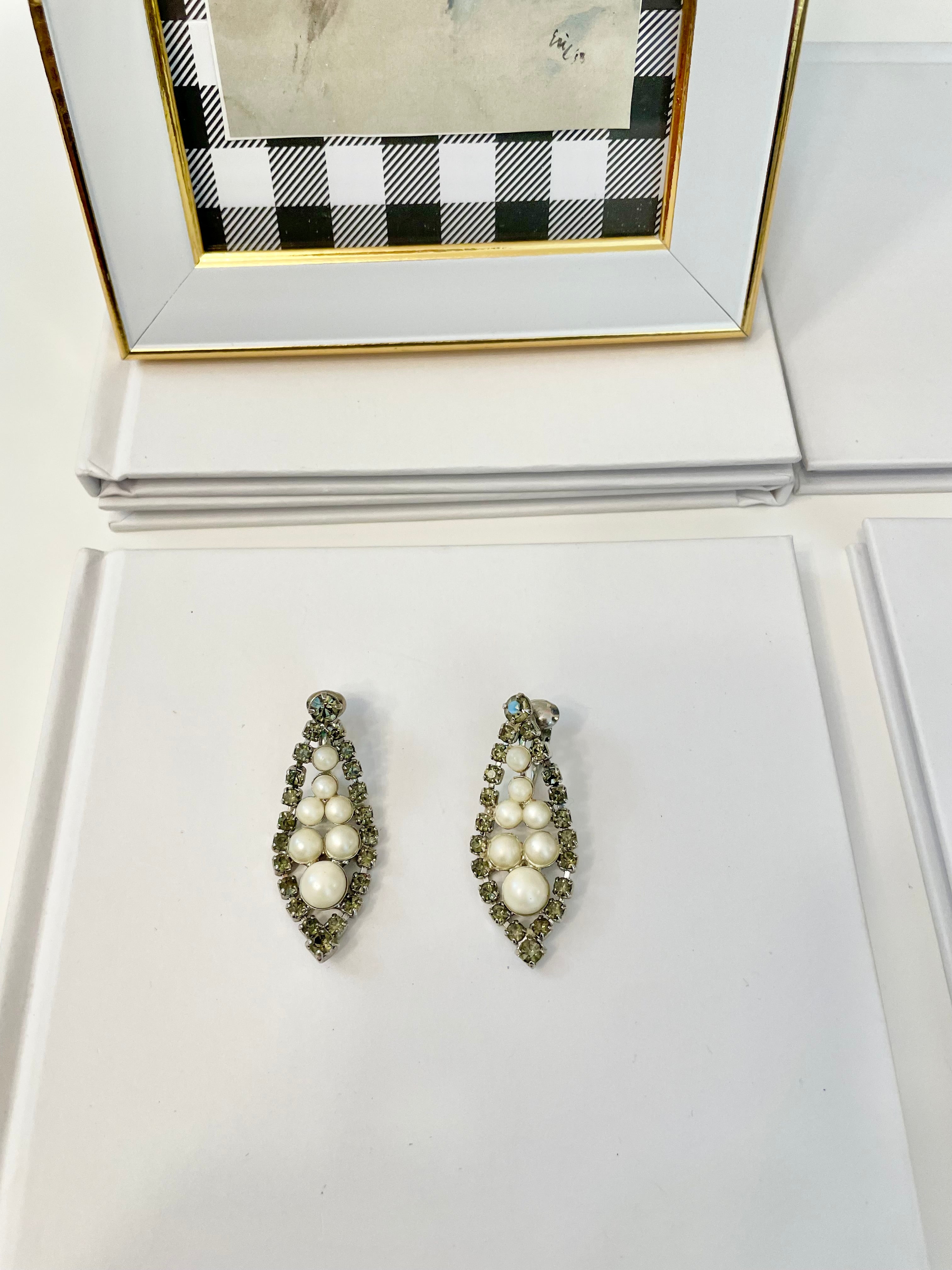 Isn't she charming... the lady loves a pearl drop earring like these! so elegant