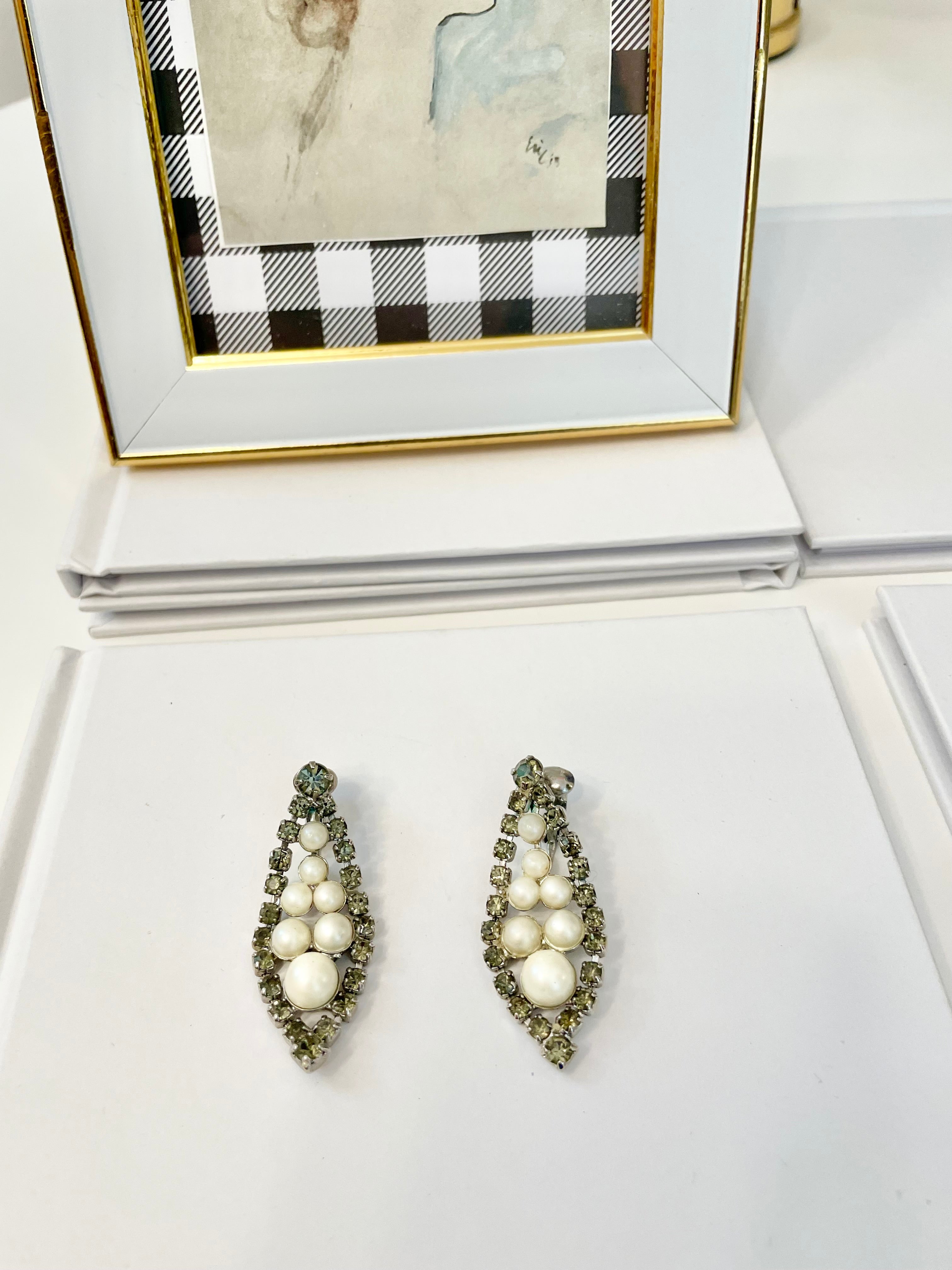 Isn't she charming... the lady loves a pearl drop earring like these! so elegant