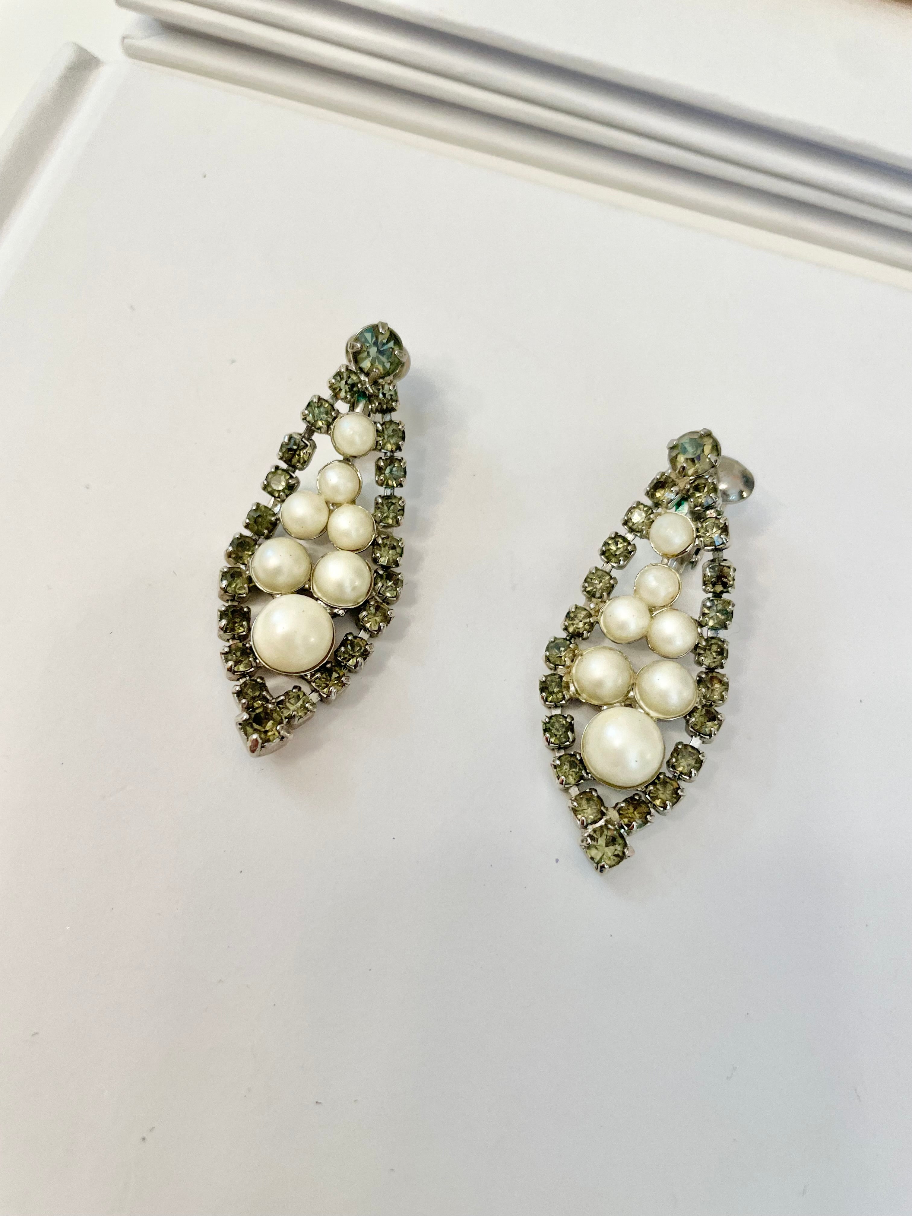 Isn't she charming... the lady loves a pearl drop earring like these! so elegant