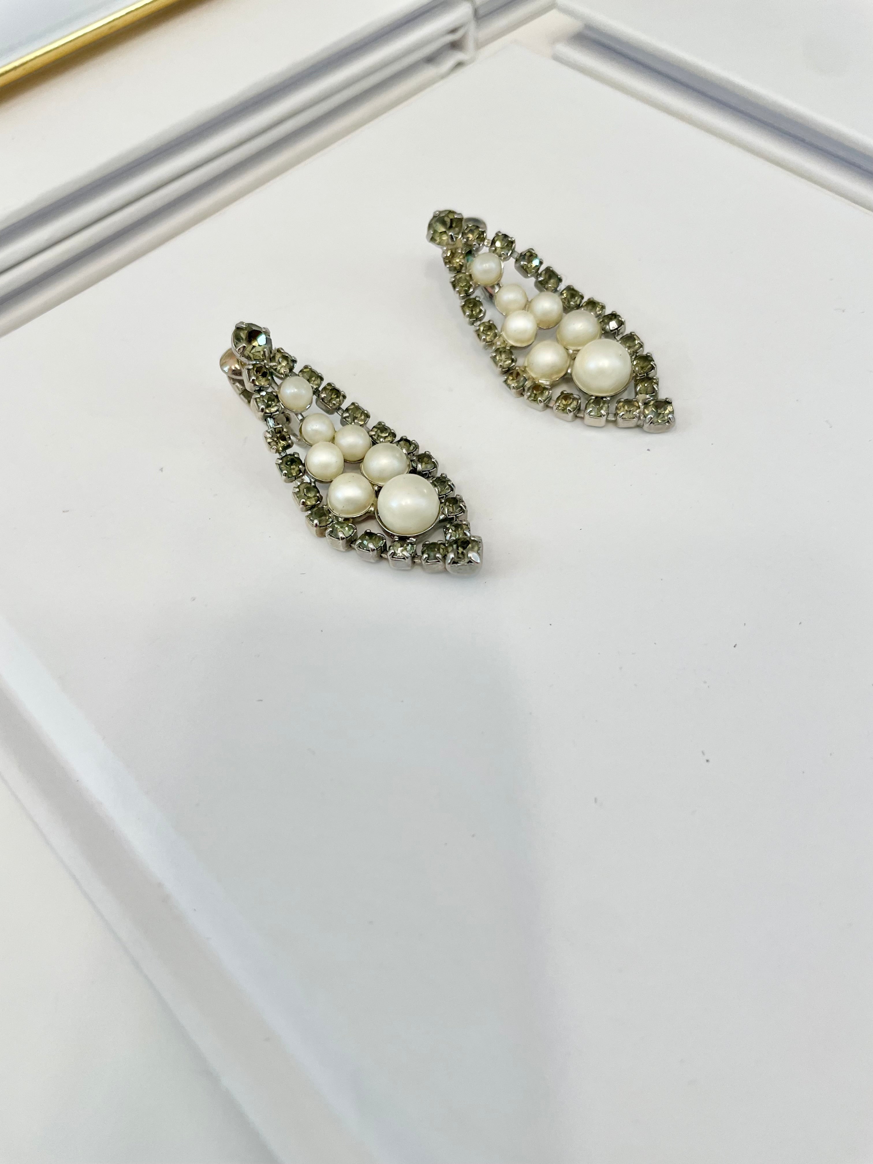 Isn't she charming... the lady loves a pearl drop earring like these! so elegant
