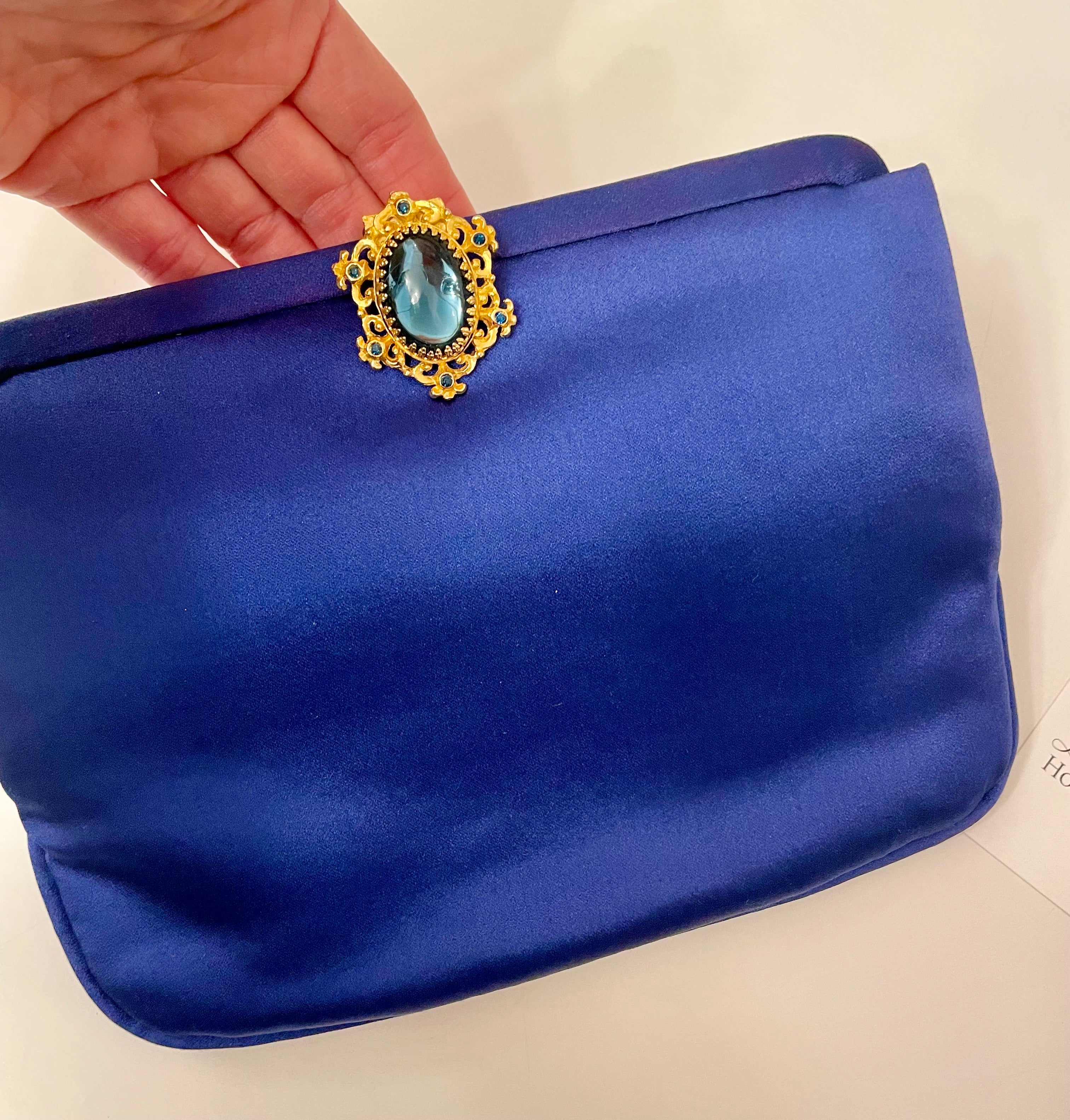 Glamorous and chic, 1960's vintage rich royal blue satin clutch bag, with stunning closure...so elegant