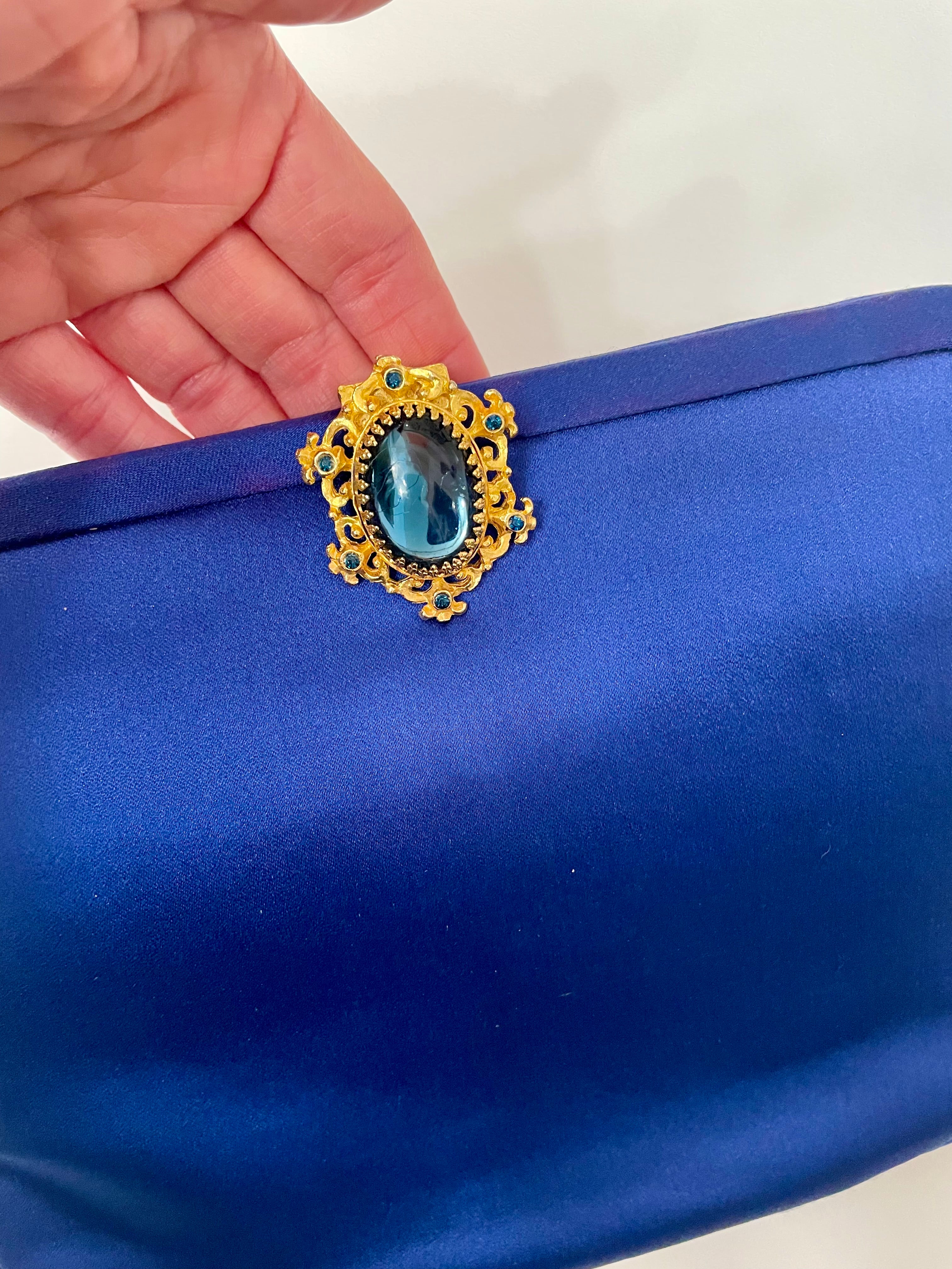 Glamorous and chic, 1960's vintage rich royal blue satin clutch bag, with stunning closure...so elegant