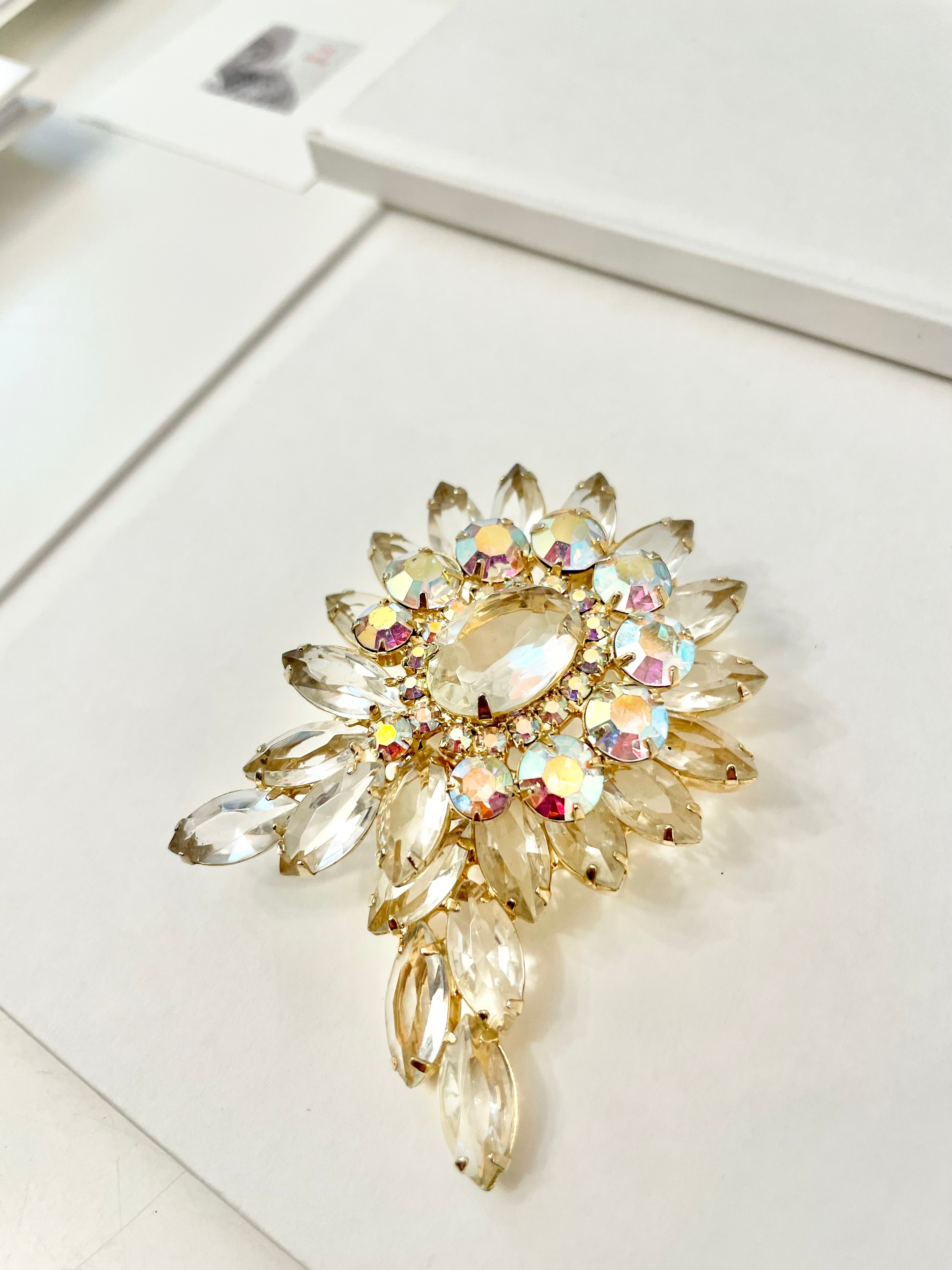 1960's Heiress, and her divine collection of crystal brooches! This one is to die for!