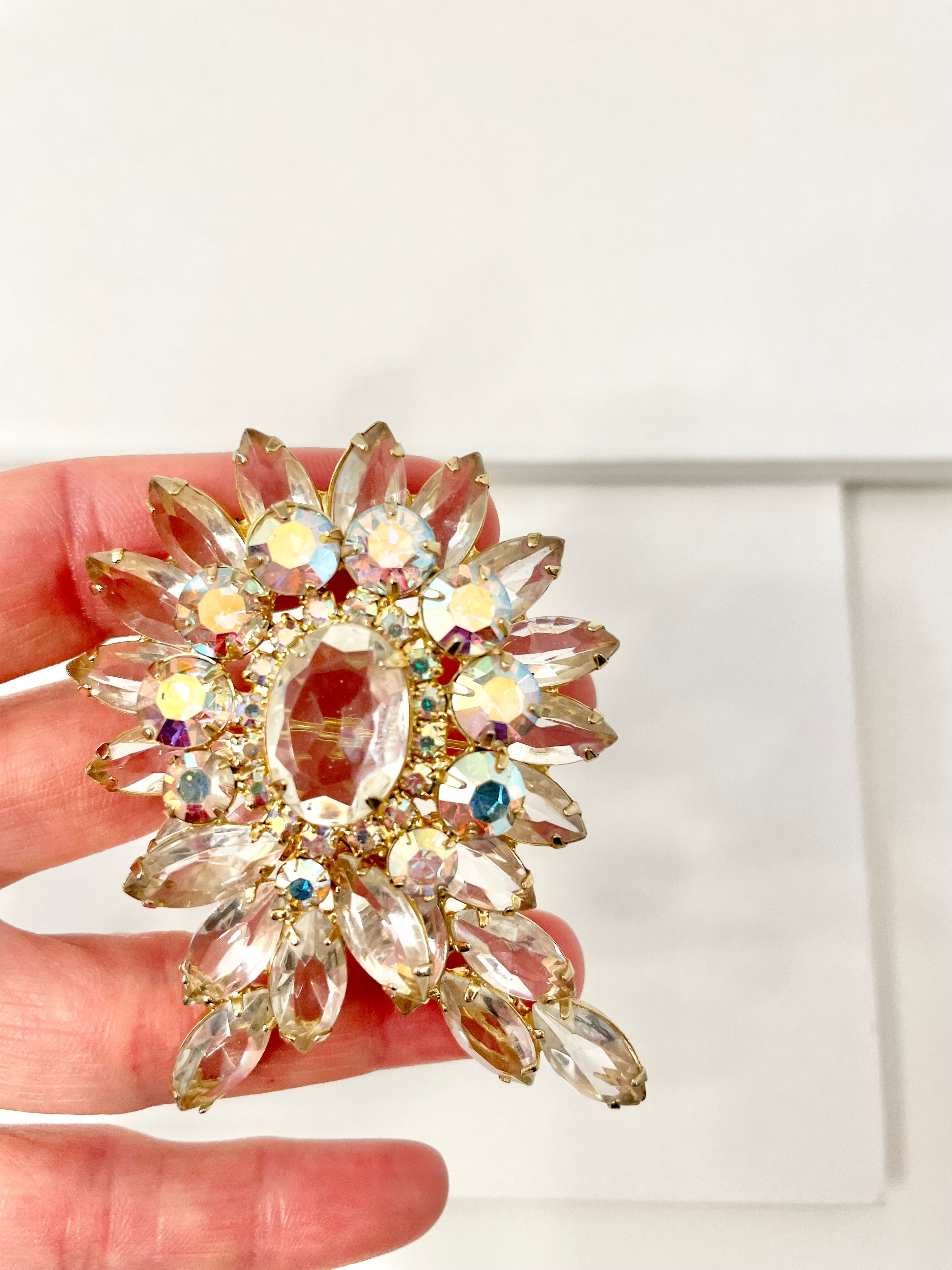 1960's Heiress, and her divine collection of crystal brooches! This one is to die for!
