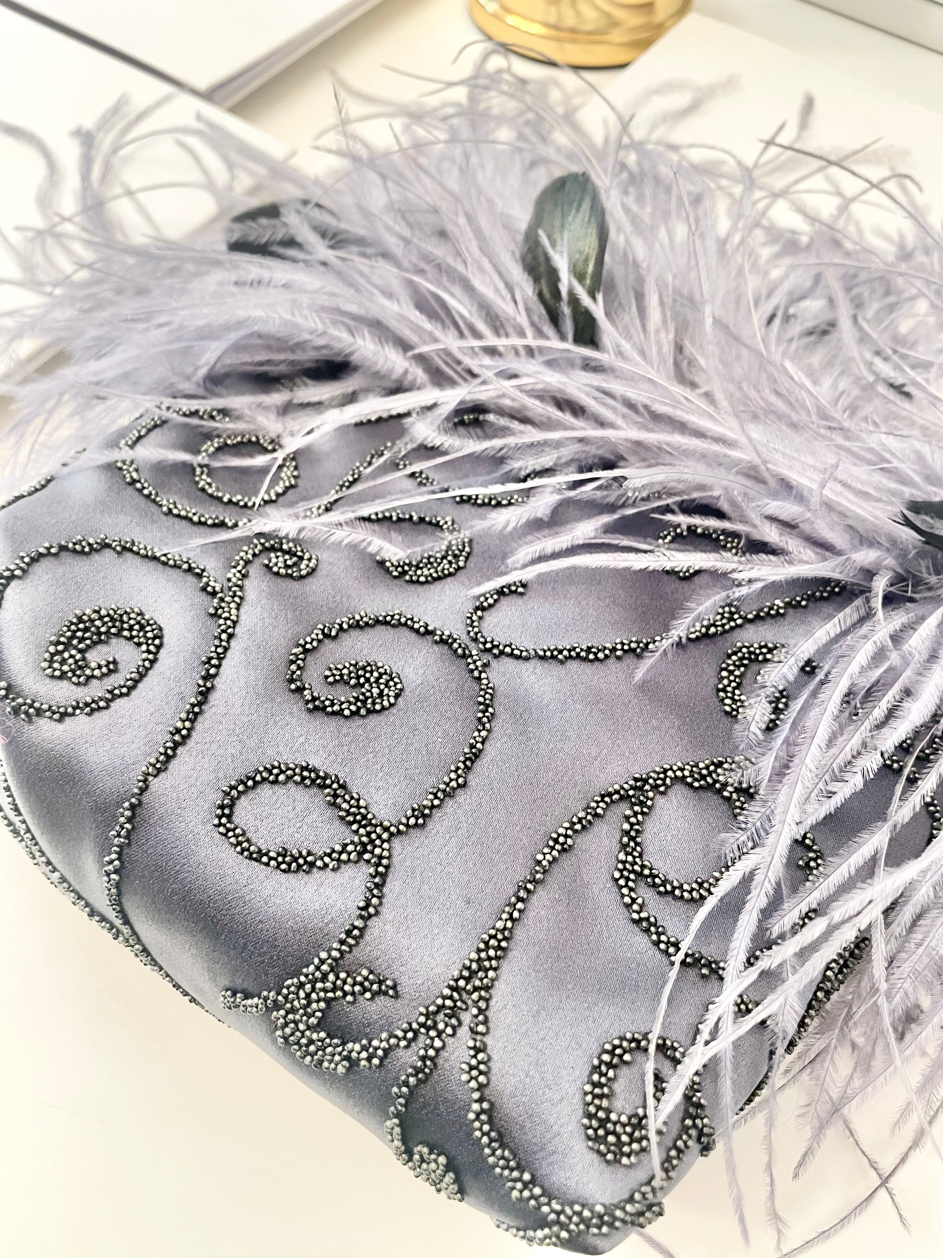 The Cheeky Mistress loves a grand entrance.. When she's wearing her ostrich feather bag, everyones's looking!