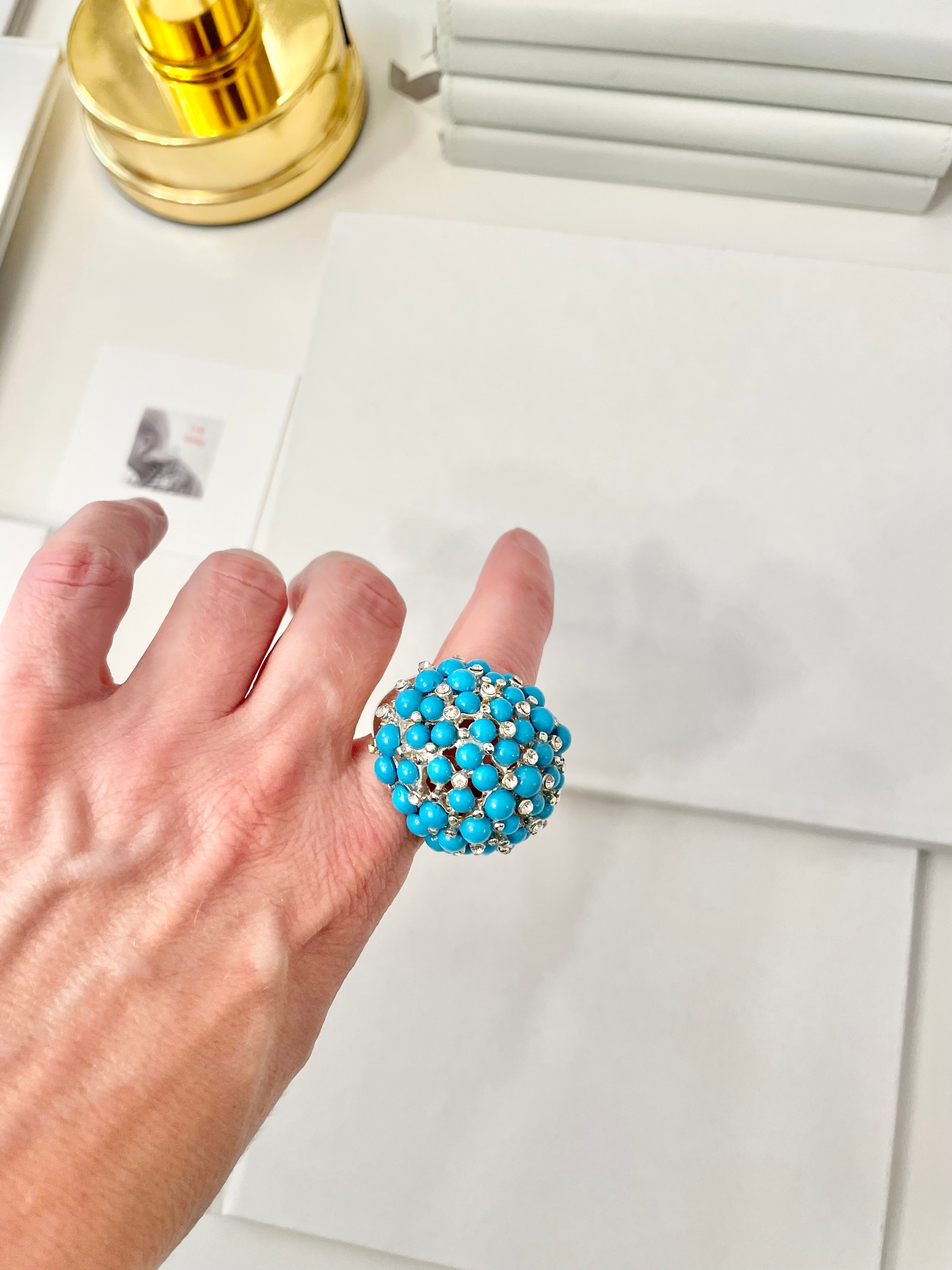 The Happy Hostess and her colorful life...this large faux turquoise cocktail ring is making all ladies gitty!