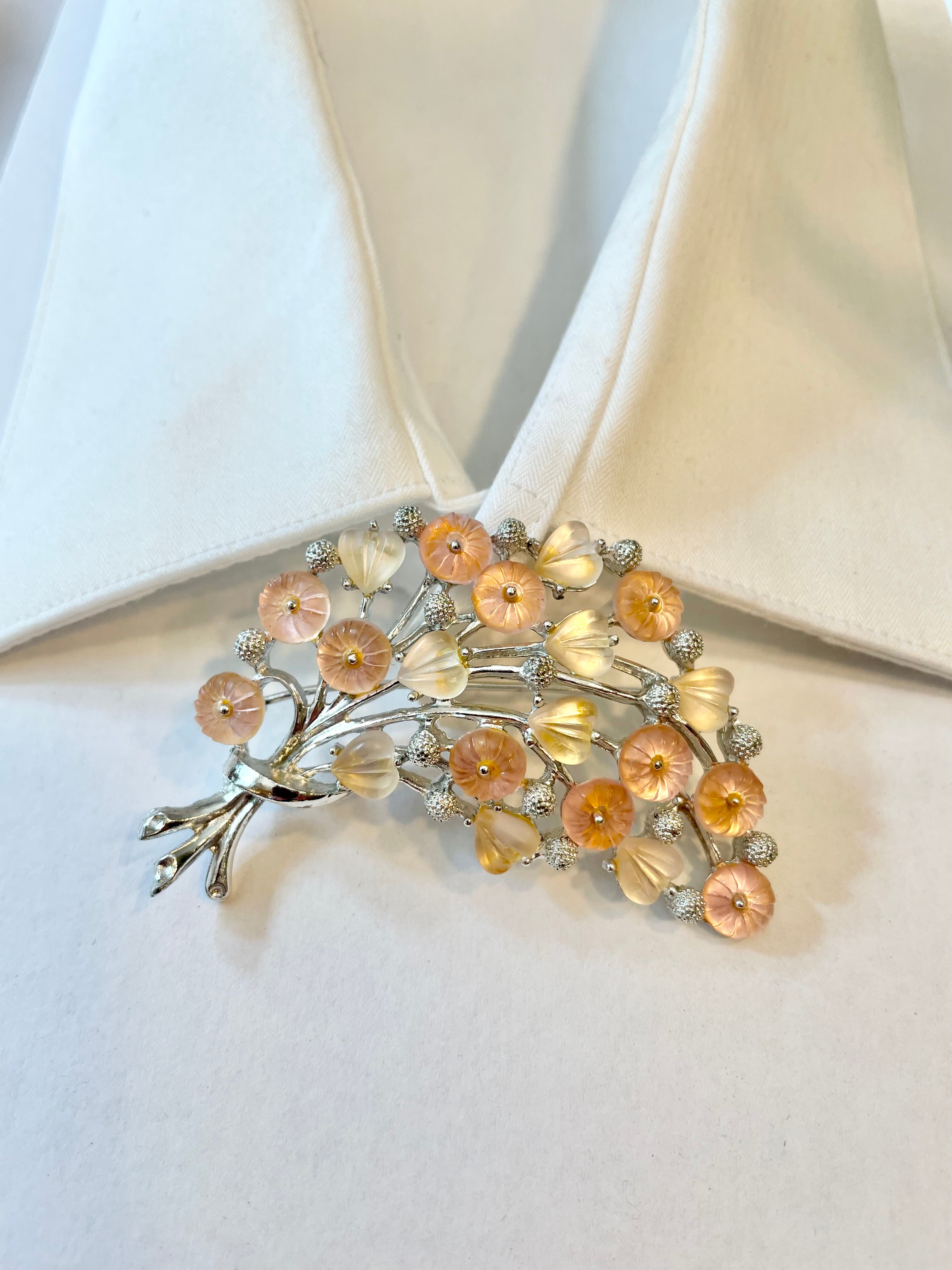 The Flirty gal and her love of all things pink, and blush... a true classy brooch!