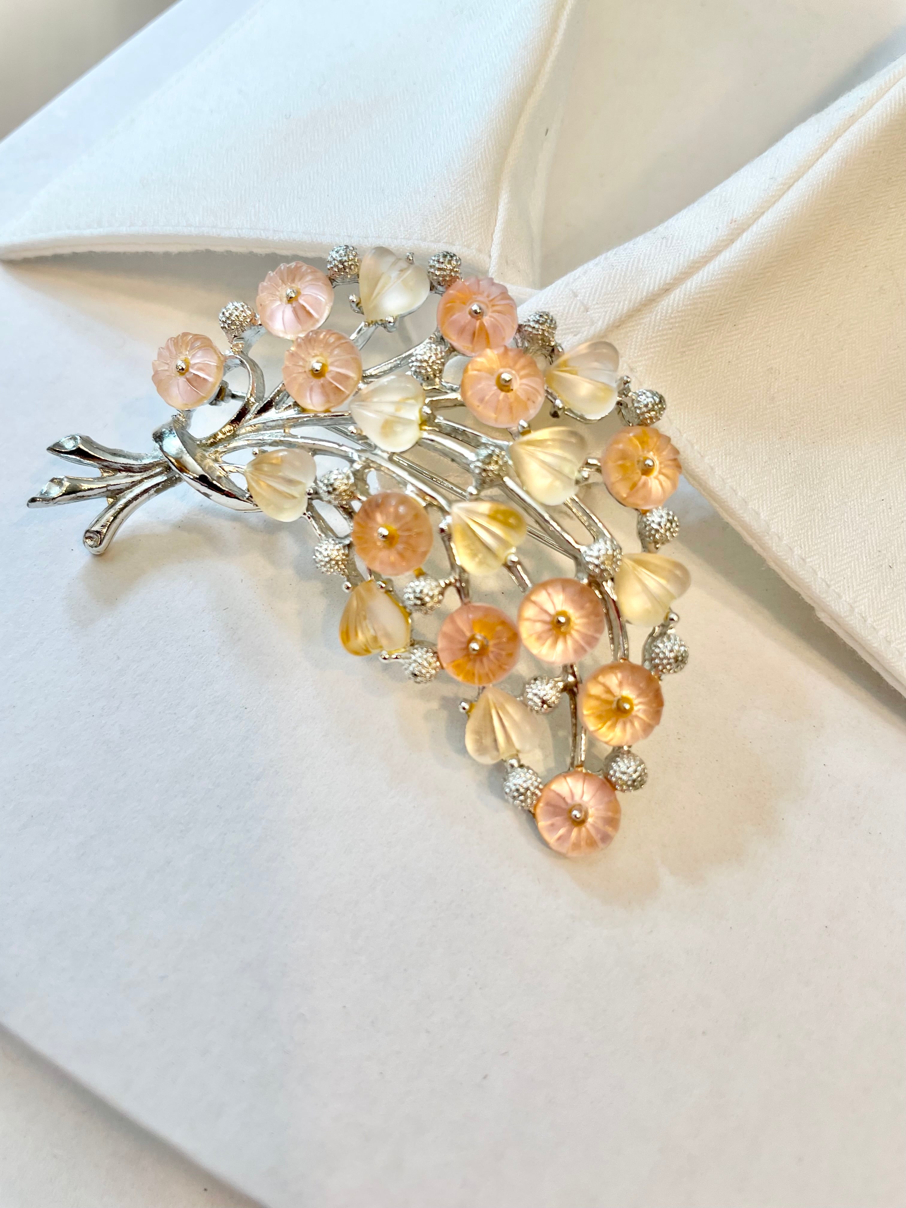 The Flirty gal and her love of all things pink, and blush... a true classy brooch!