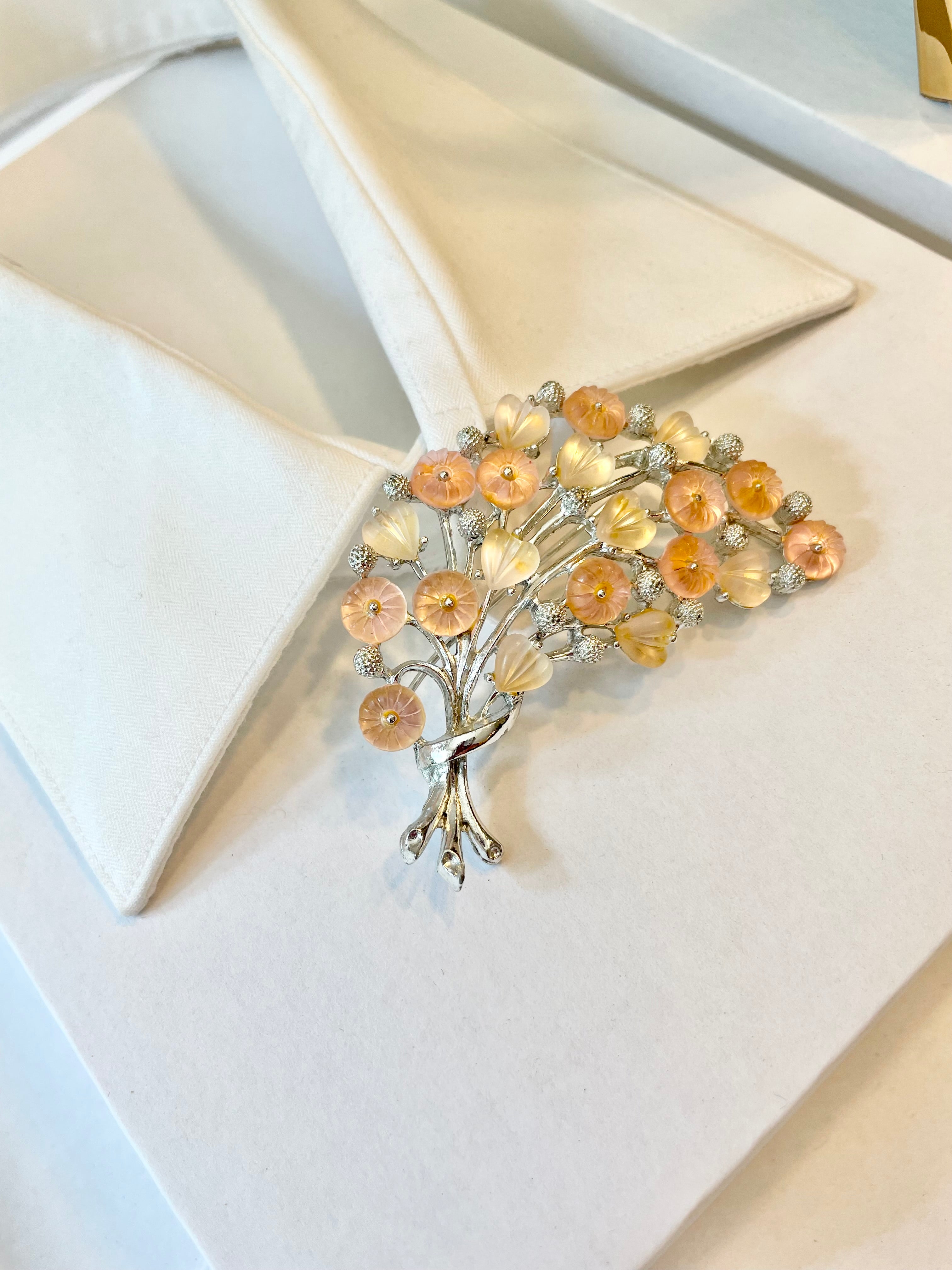 The Flirty gal and her love of all things pink, and blush... a true classy brooch!