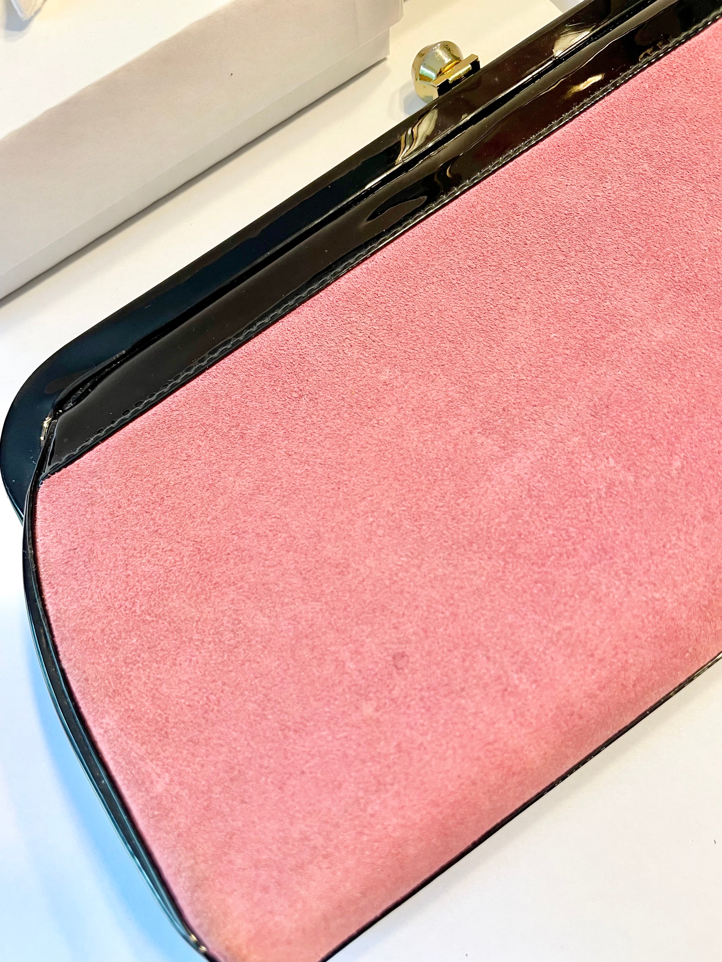 The Flirty Gal loves anything pink... the 1960's extraordinary pink, and black patent leather bag is so brilliant!