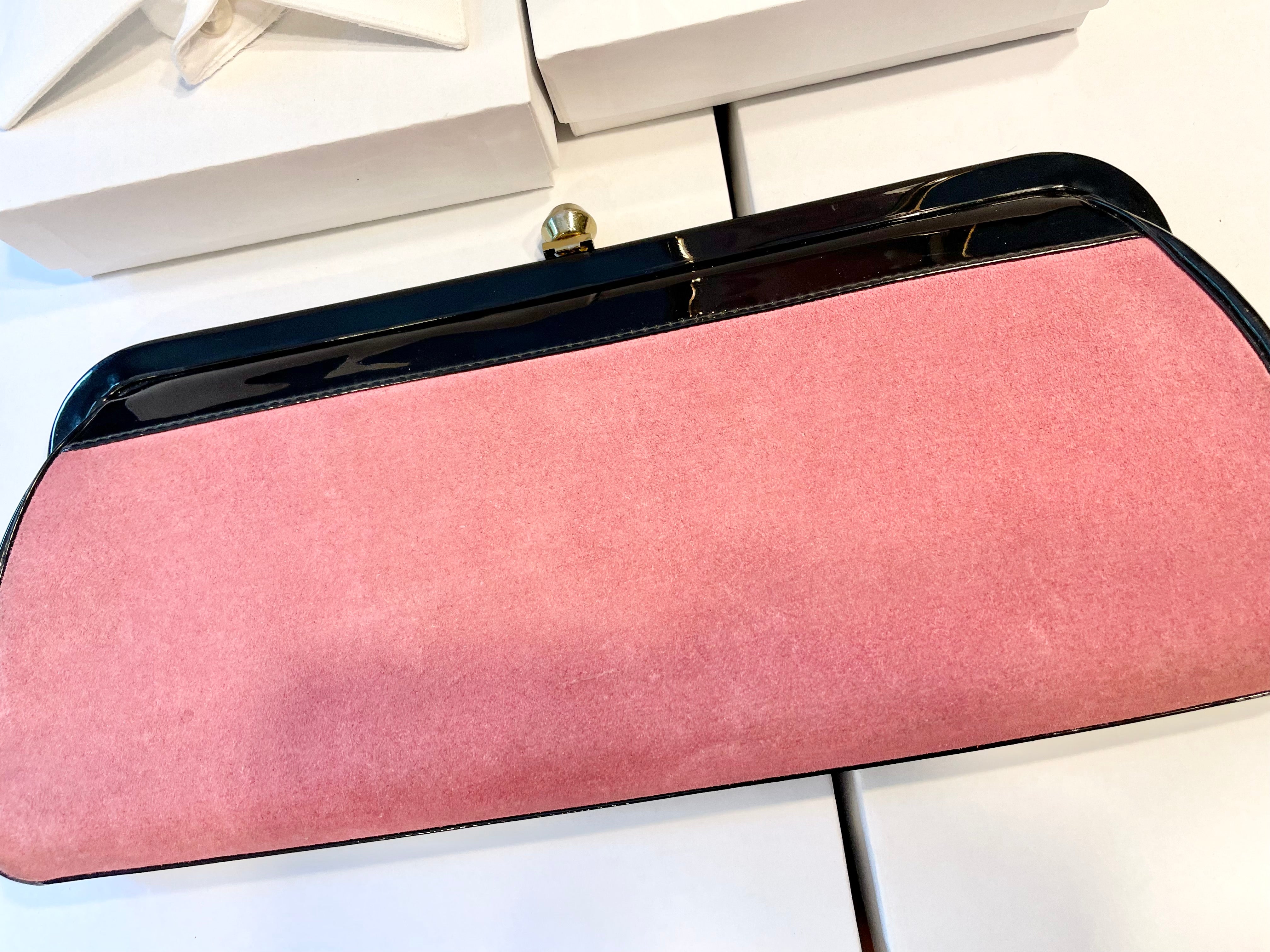 The Flirty Gal loves anything pink... the 1960's extraordinary pink, and black patent leather bag is so brilliant!