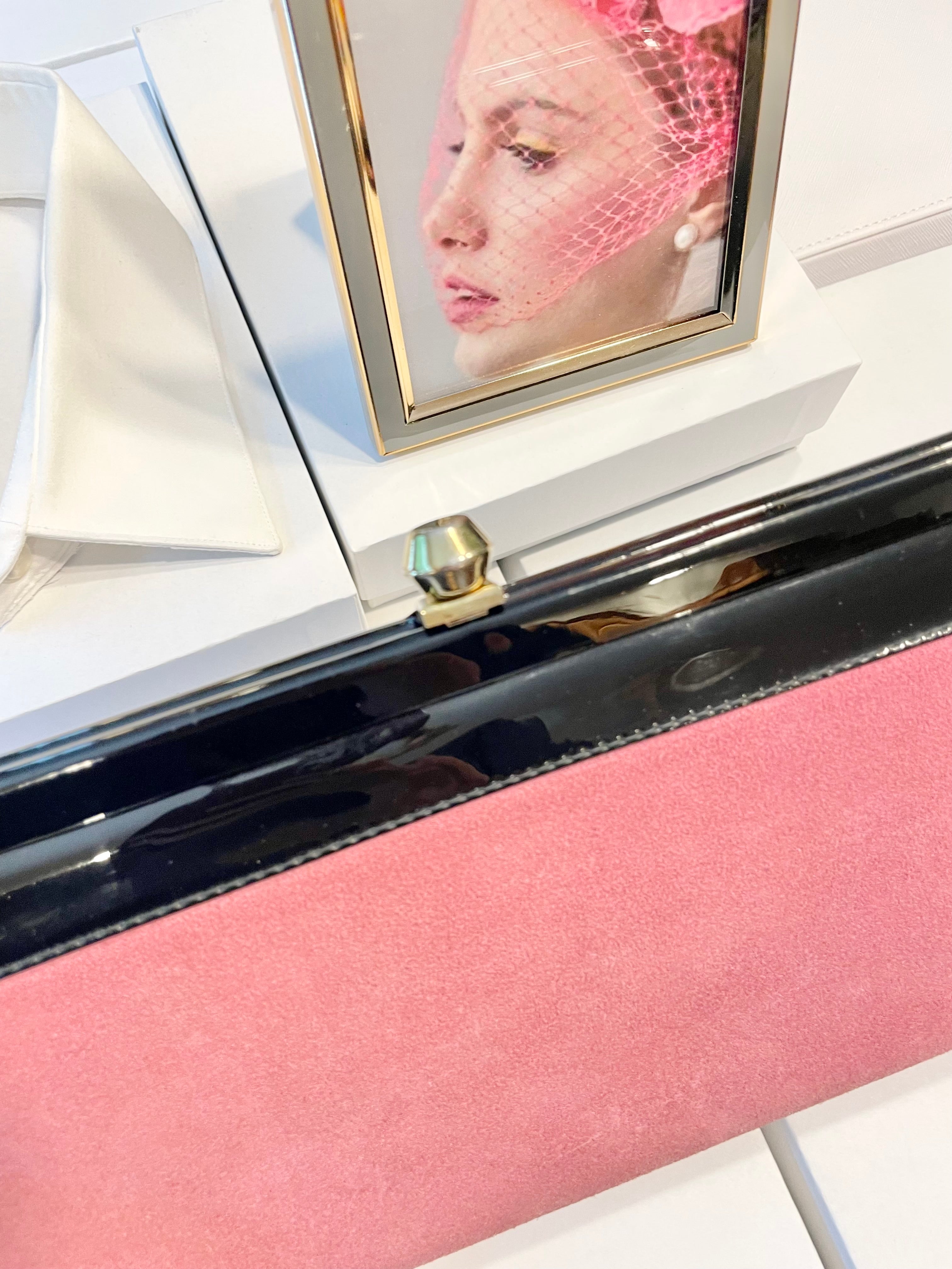 The Flirty Gal loves anything pink... the 1960's extraordinary pink, and black patent leather bag is so brilliant!