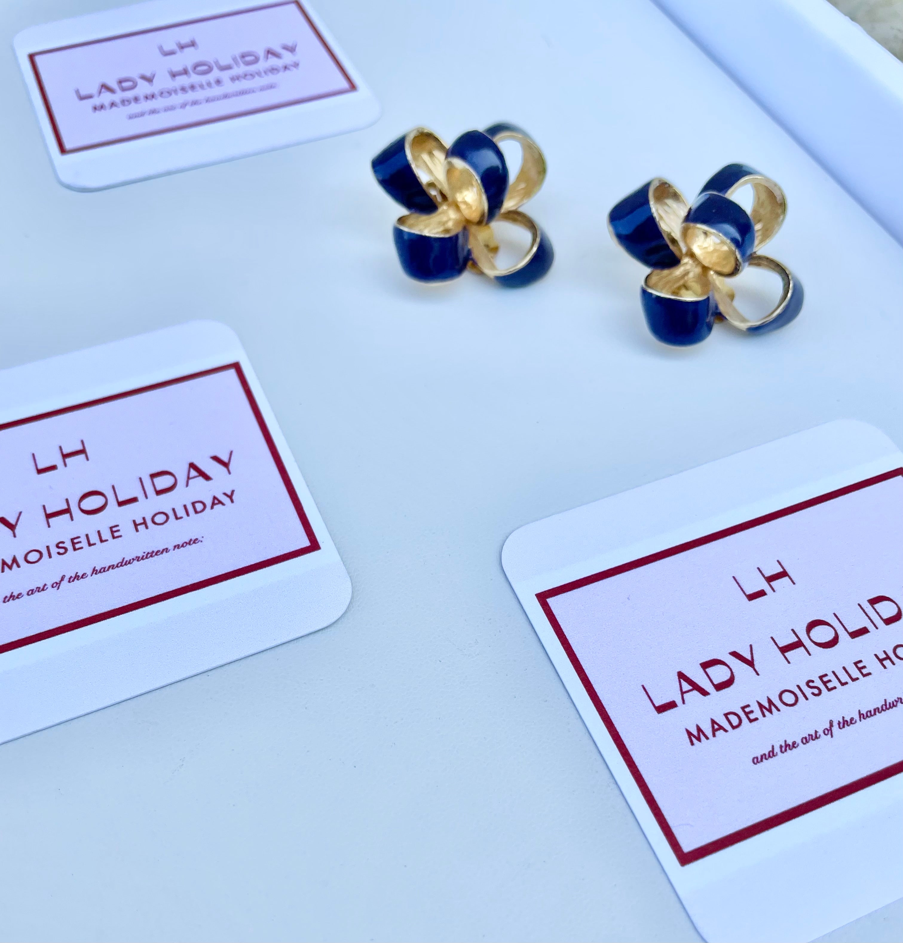 The most lovely purple bow earrings... so feminine!